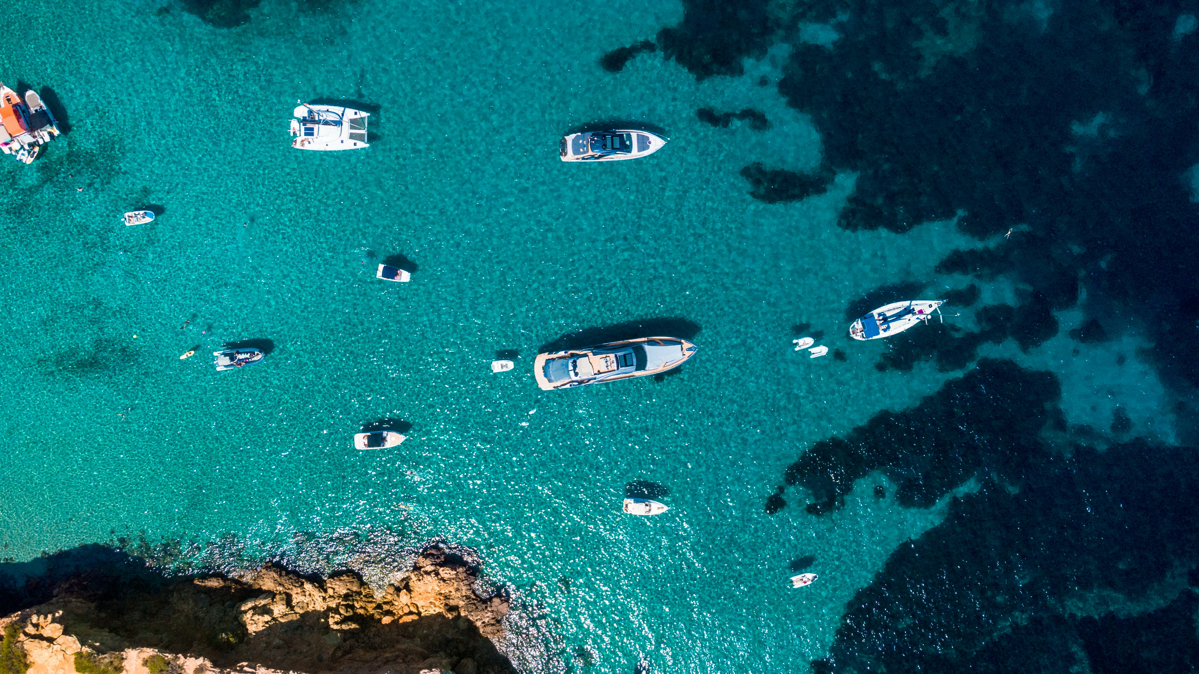 a group of boats in the water