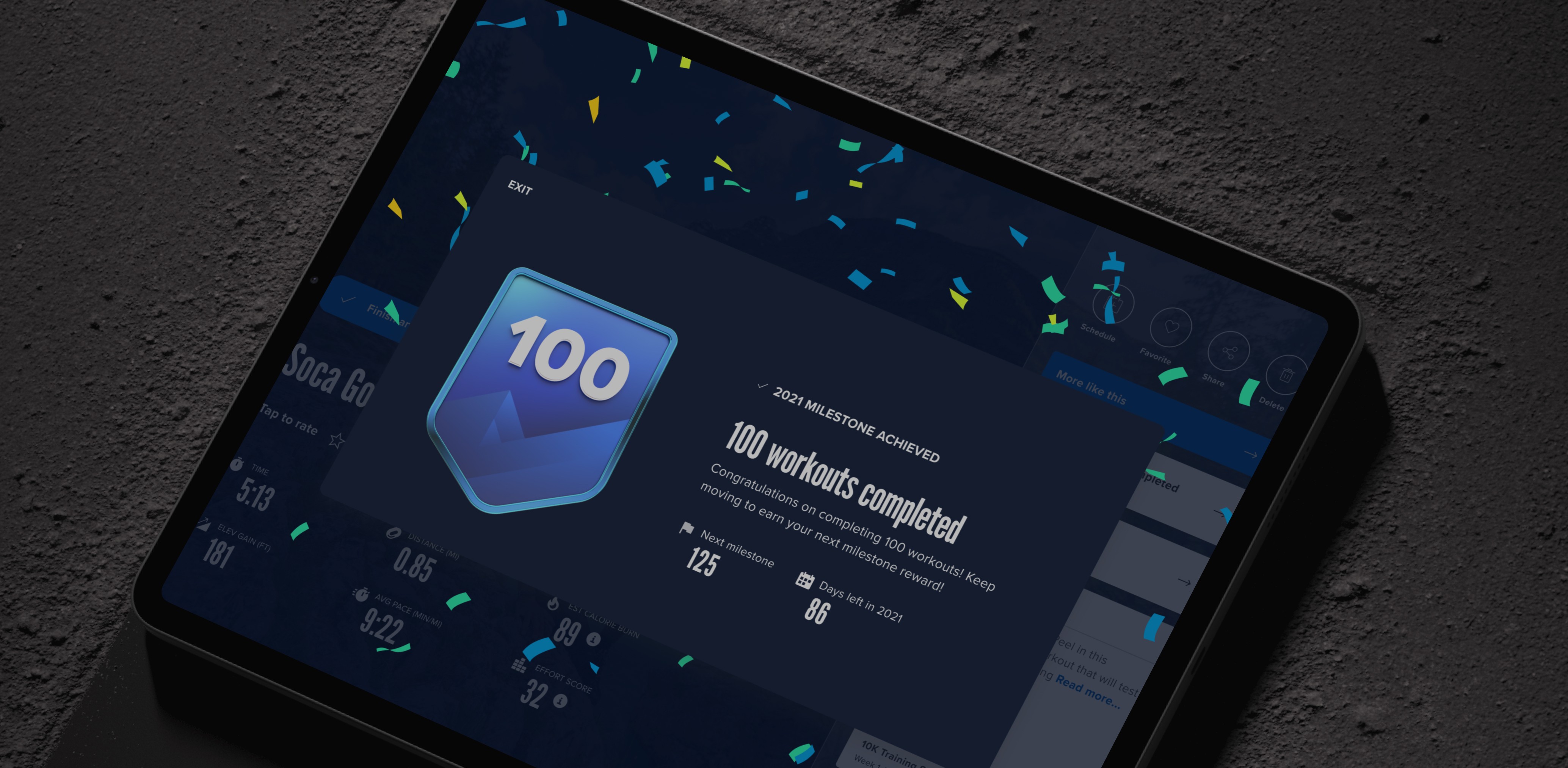 Tablet screen on a dark background showing celebration screen