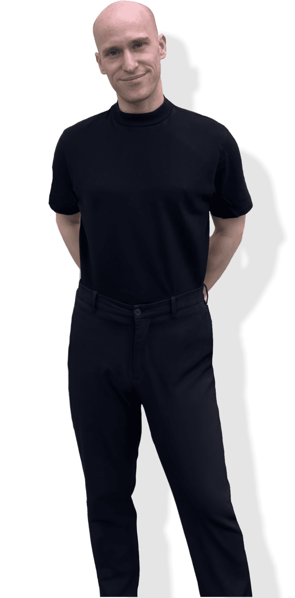 Portrait of a UX/UI designer wearing a black t-shirt and black trousers