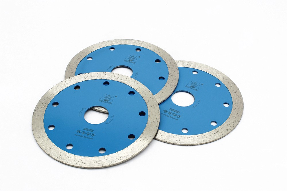 Three Sintered Continuous Turbo Blades with blue center and segmented diamond edges.