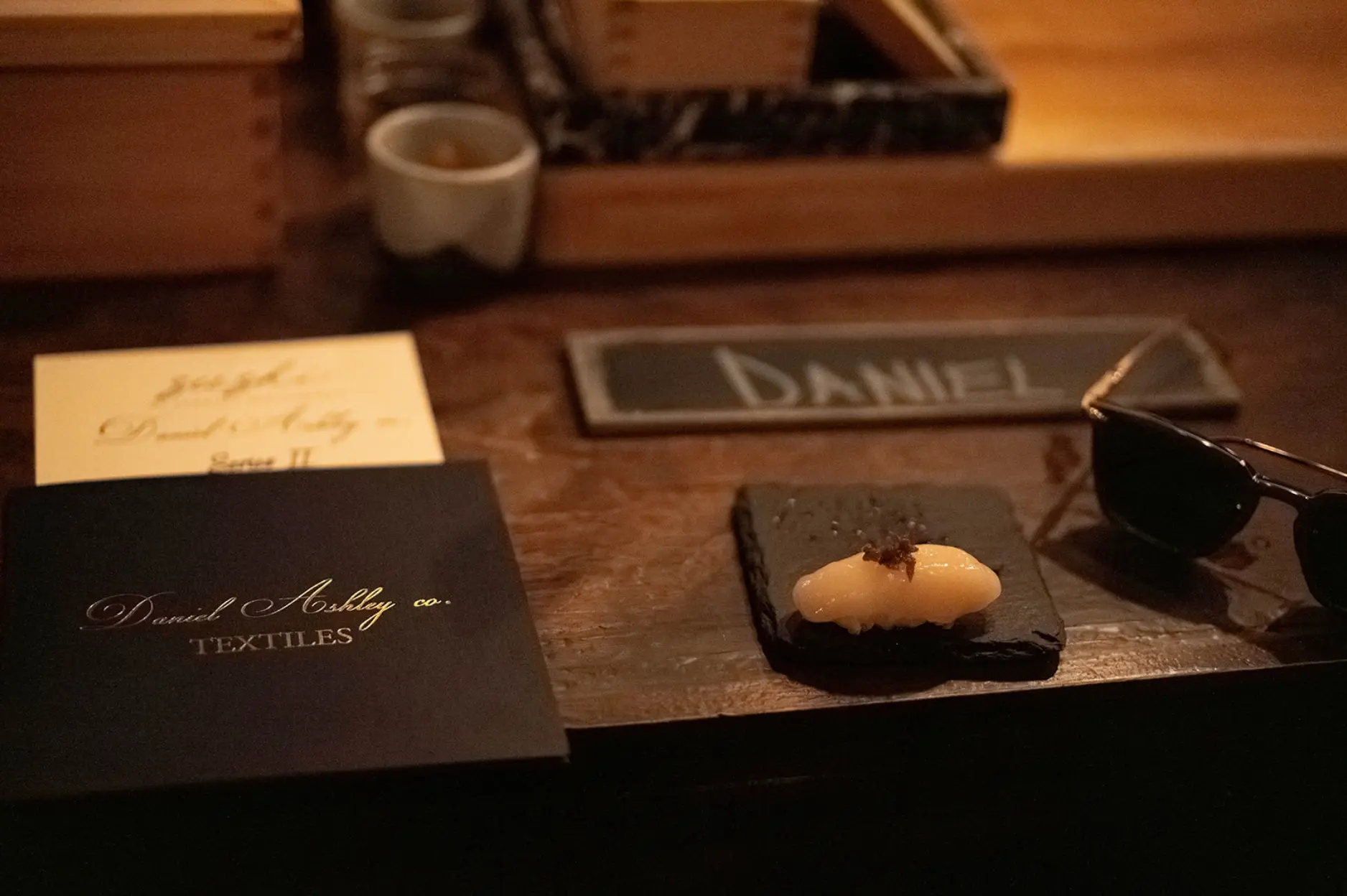 Daniel Ashley co. gifting at an omakase dinner