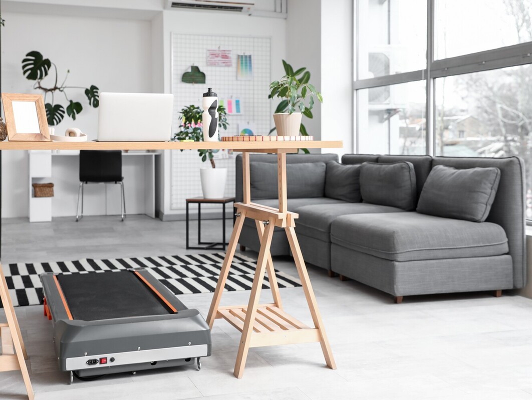 treadmill under desk in a home office for a treadmill challenge to lose weight while working