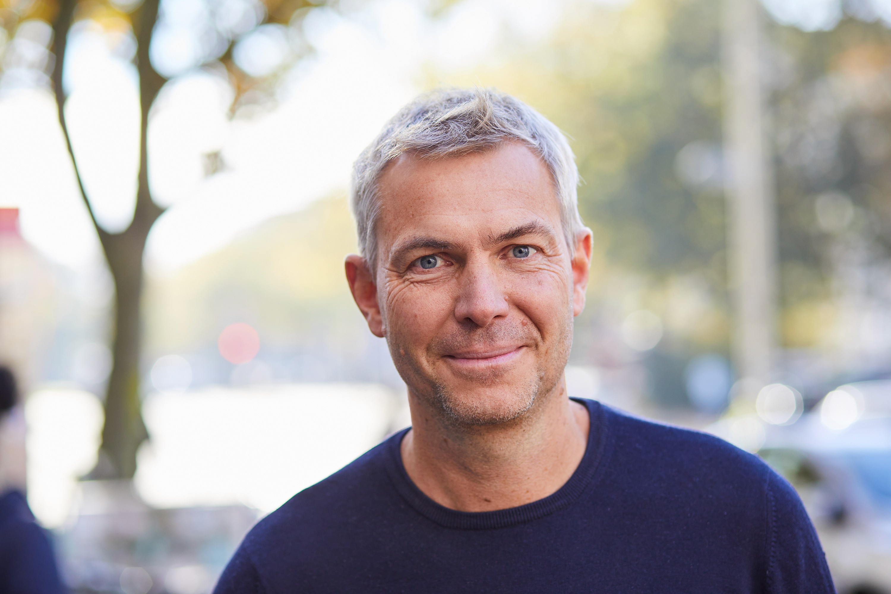 Portrait of a man smiling outdoors