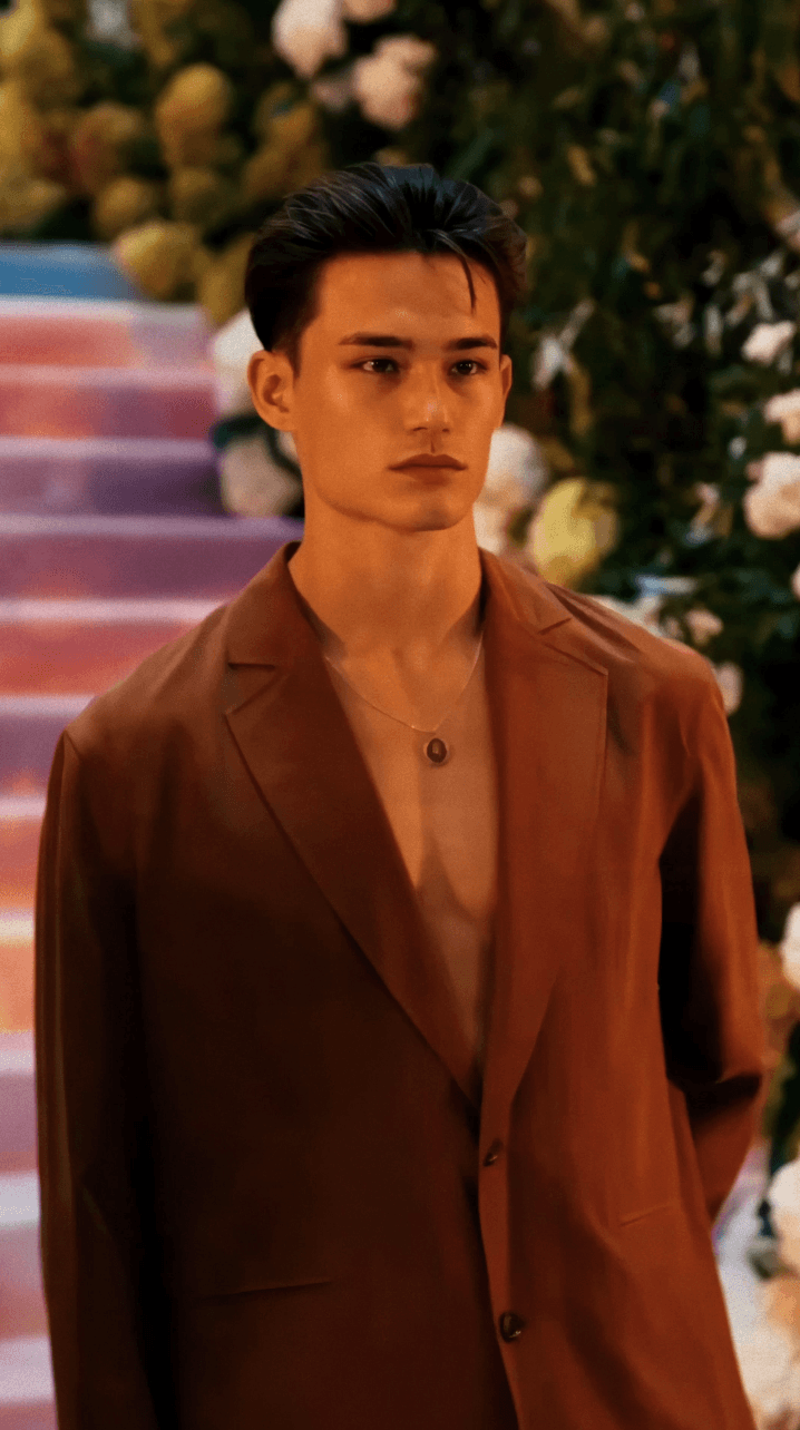 Woman in black outfit sitting on floor