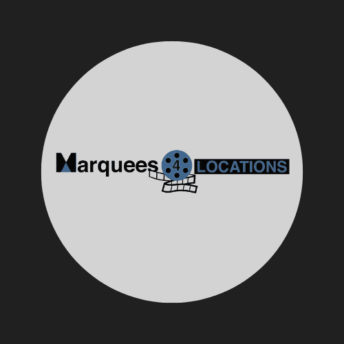 Man and two girls taking a selfie in a tent