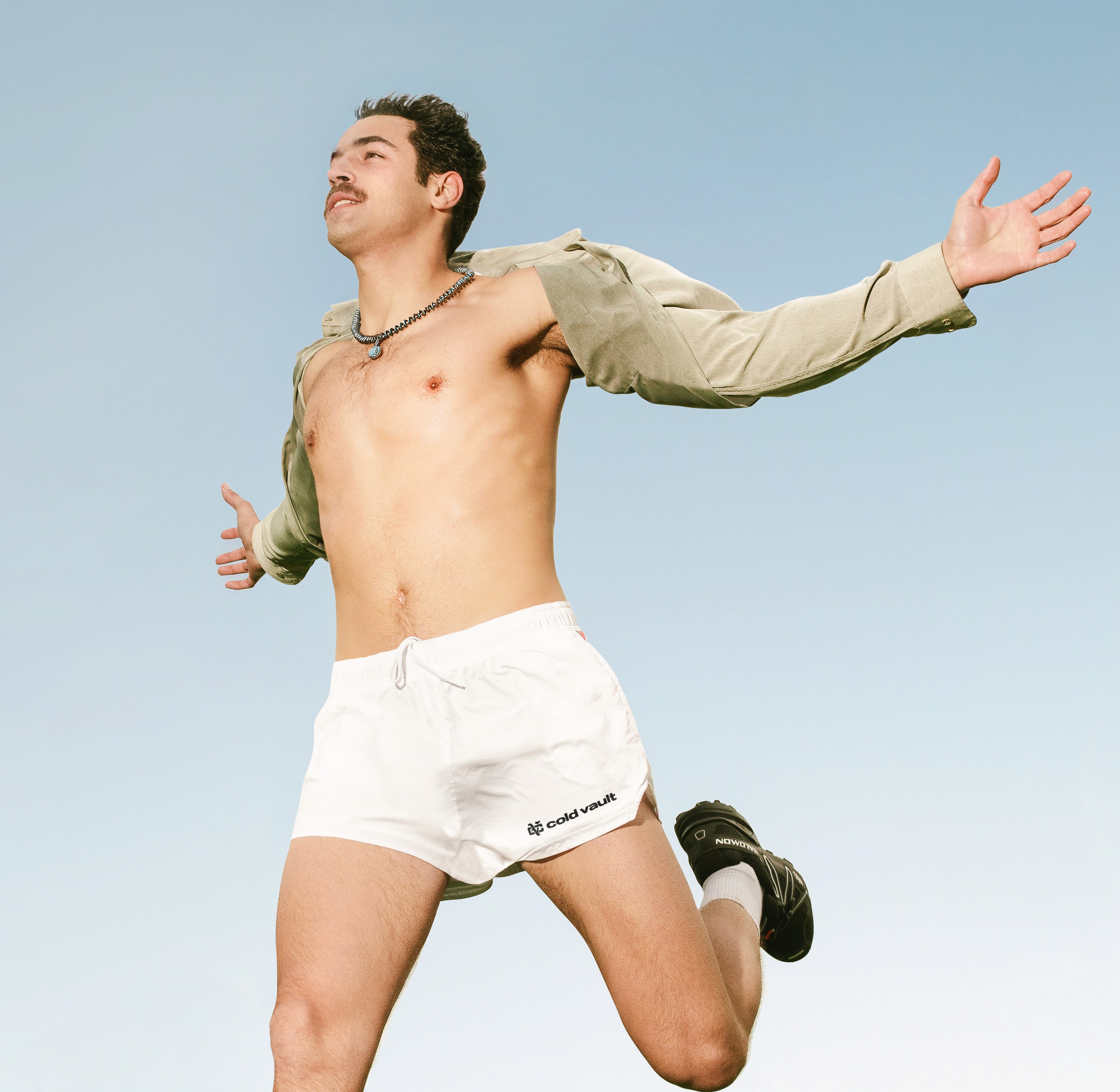 Lifestyle product photo featuring Cold Vault shorts being worn by the model