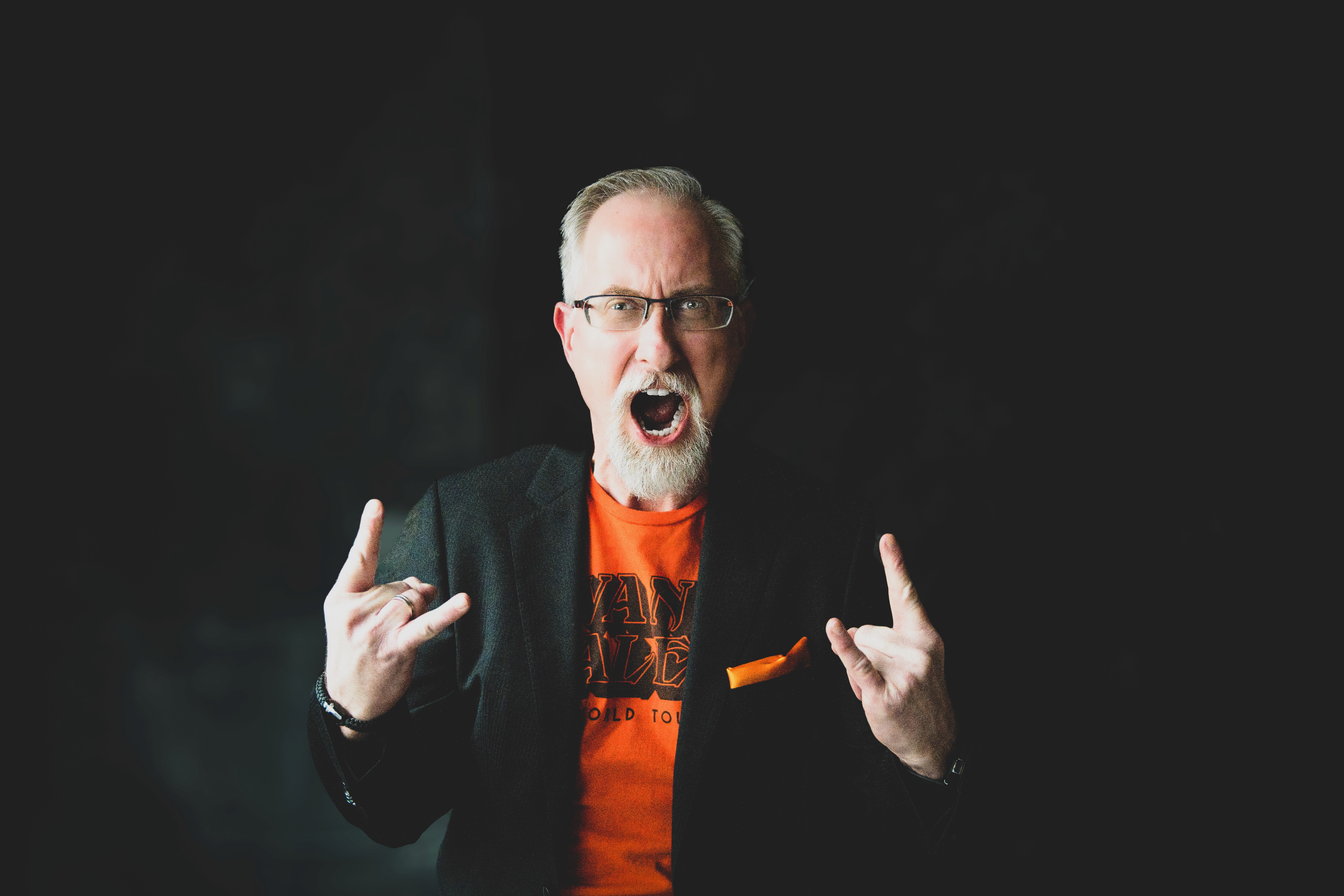 a woman holding a red flower