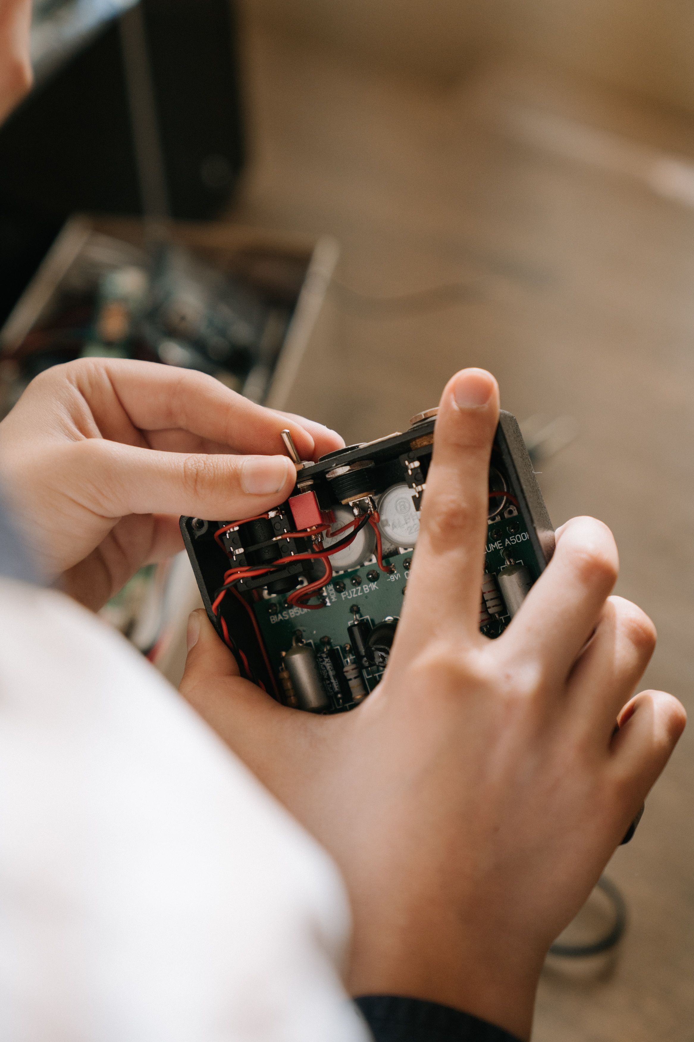 close-up-of-hands-repairing-an-electronic-circuit-board-indoors,-demonstrating-e - cottonbro-studio (pexels)