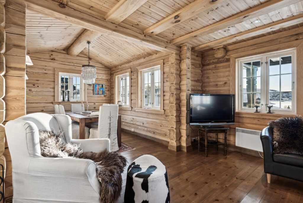Step into comfort: the 2008 log cabin’s living room, where memories were made.