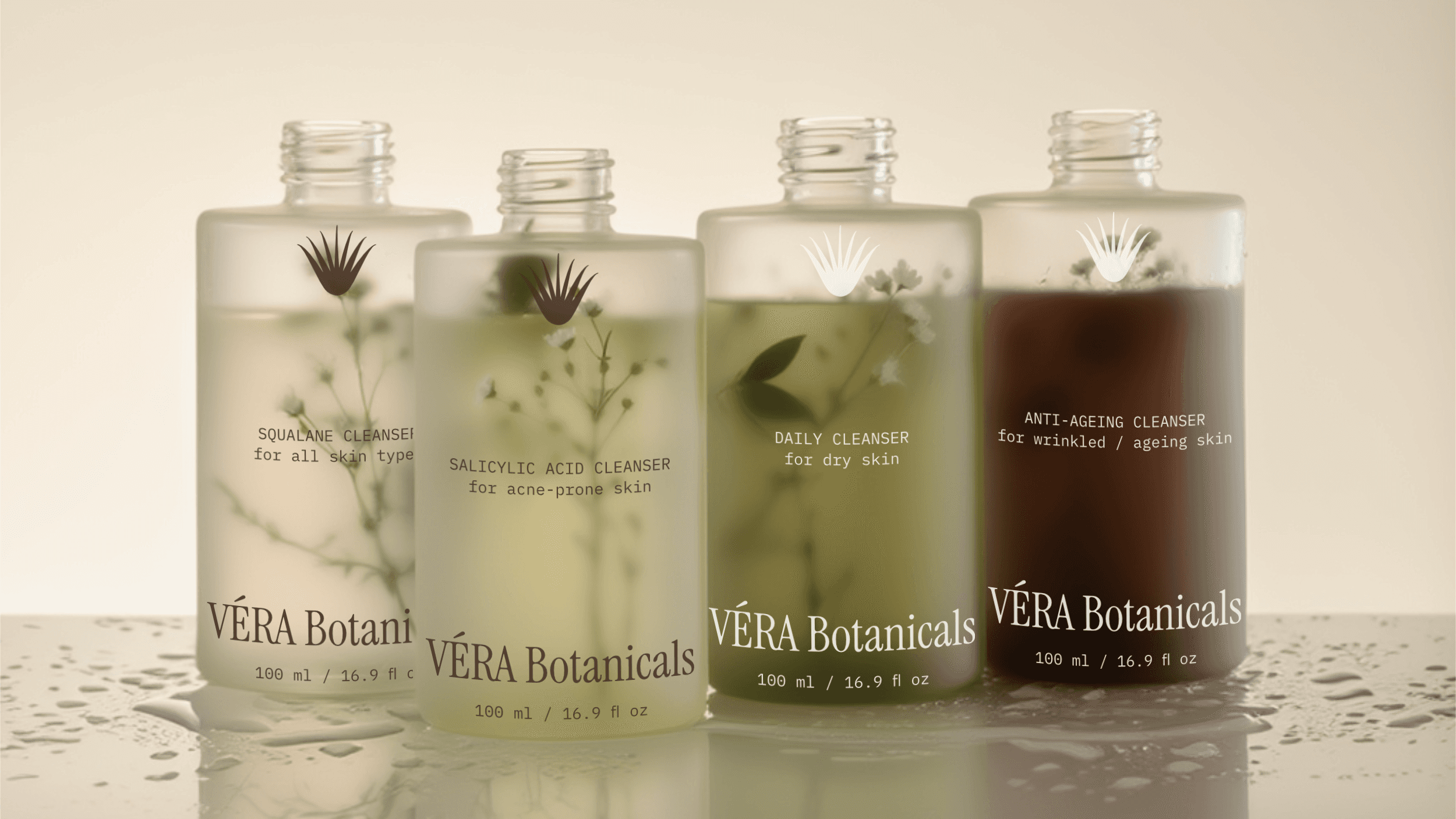Packaging bottle designs for the organic skincare brand VÉRA Botanicals. The bottles feature a frosted glass finish with different colored liquids in different tones of brown and green. The bottles are filled with some flowers and plants.