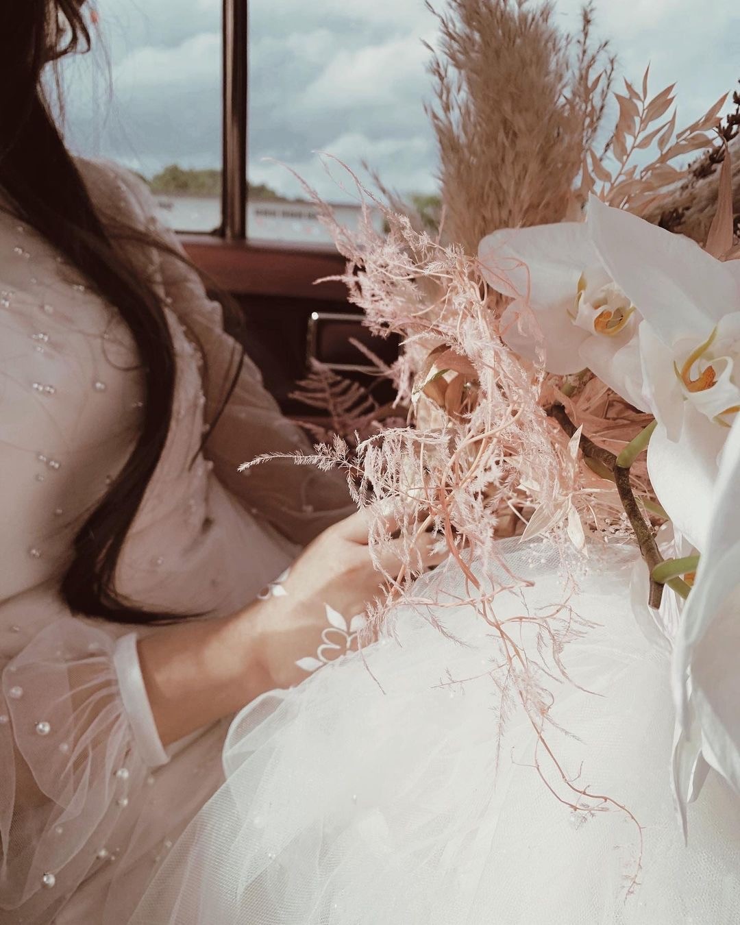 Bride in the car in Singapore.