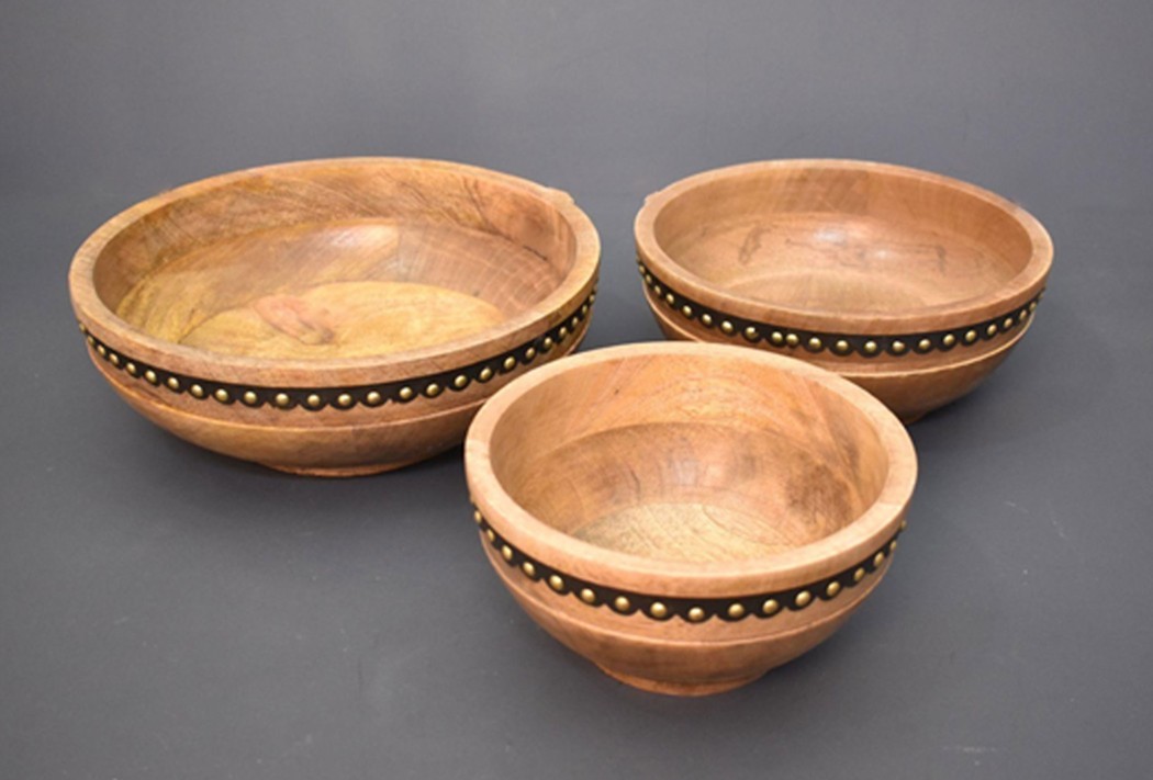 Handcrafted wooden serving bowls with metal stud detailing