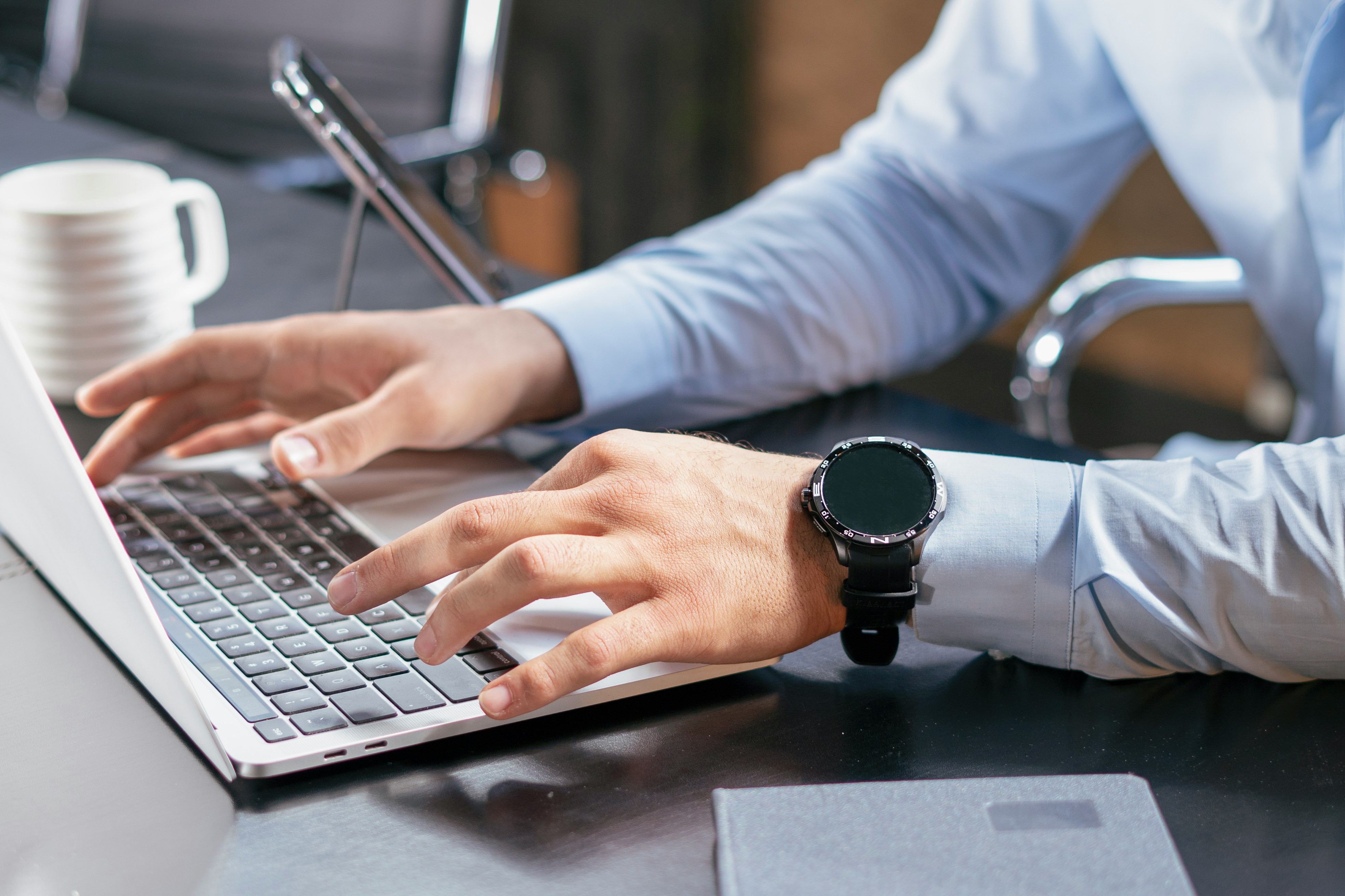 person working on laptop - Shopify Cookie Popup