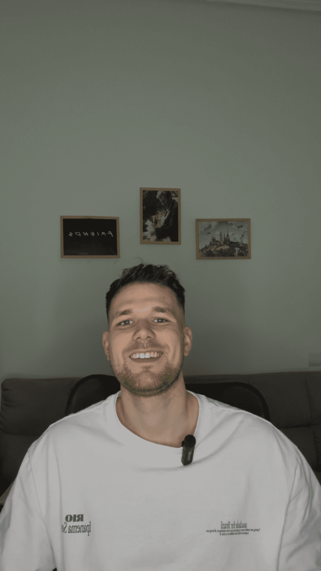 A portrait of a young man smiling