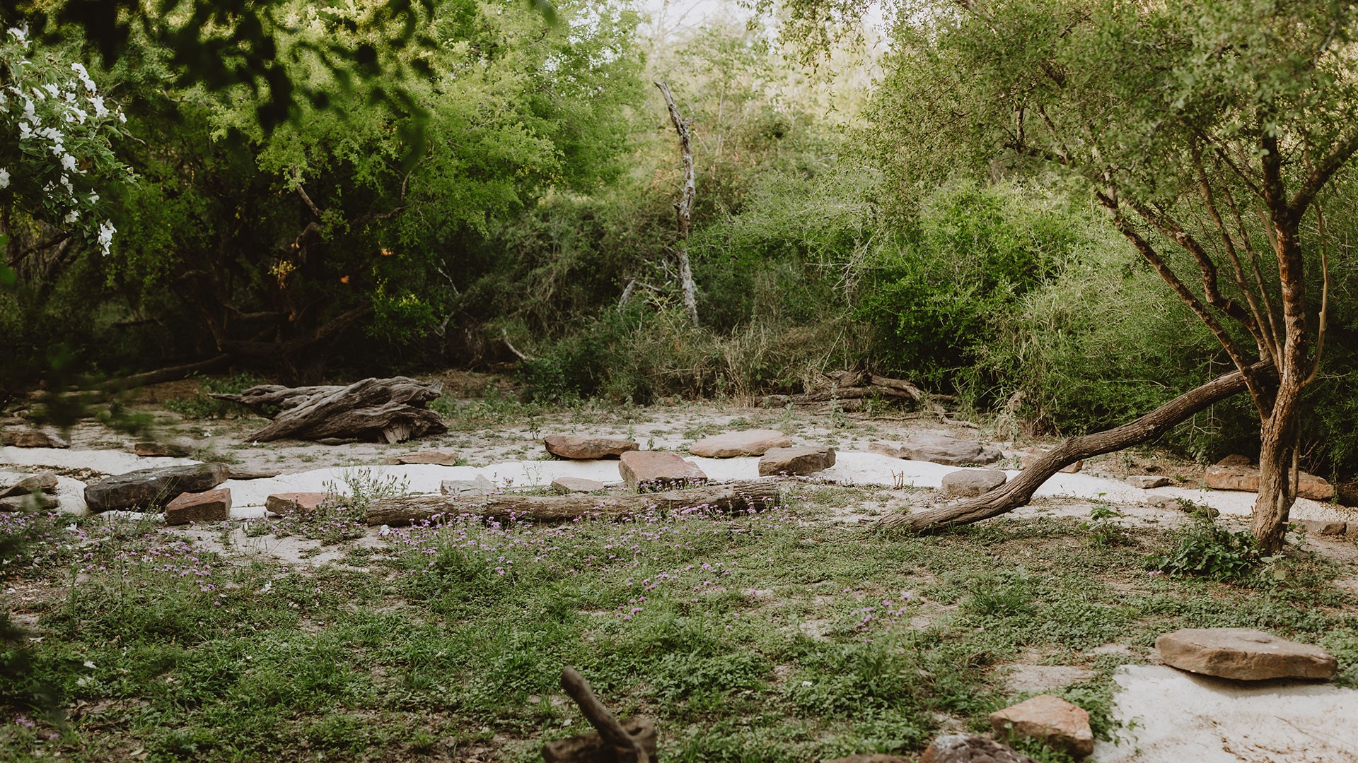 a person sitting in a yellow boat on a river