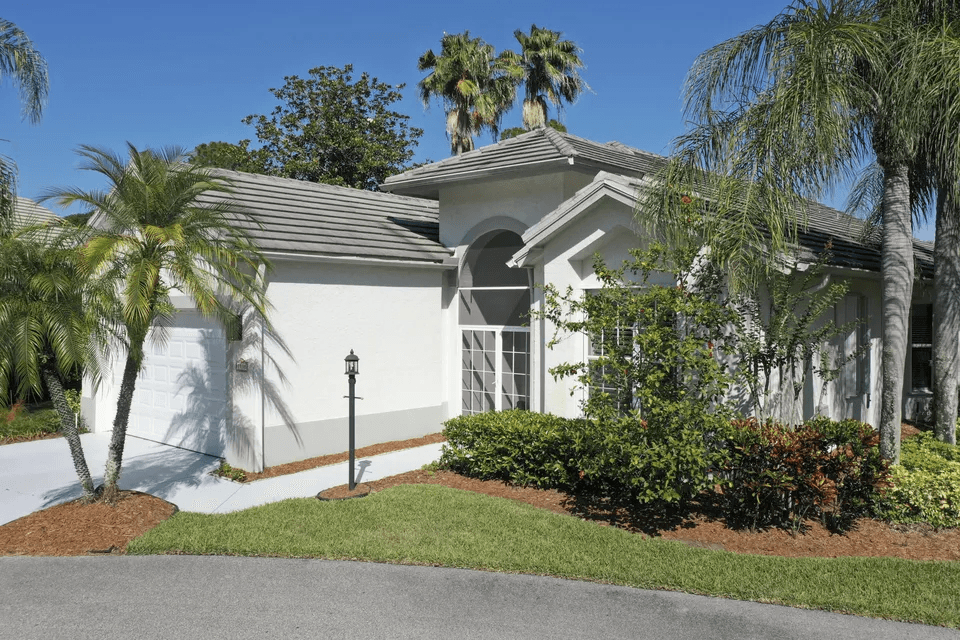 1994 New Roof Construction in Hawks View, PGA Village, Port St Lucie with Entegra Flat Broomswept Tile in Natural Gray