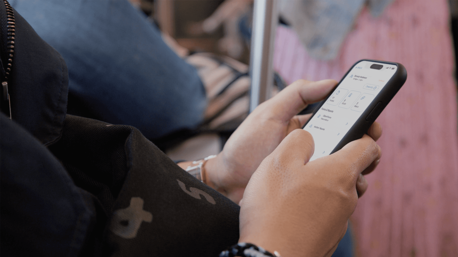 An individual using Giv on their phone.