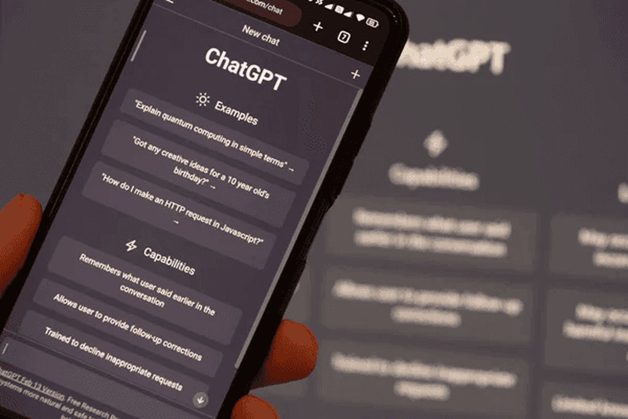 ChatGPT mobile interface on smartphone displaying AI examples and capabilities of the language model.