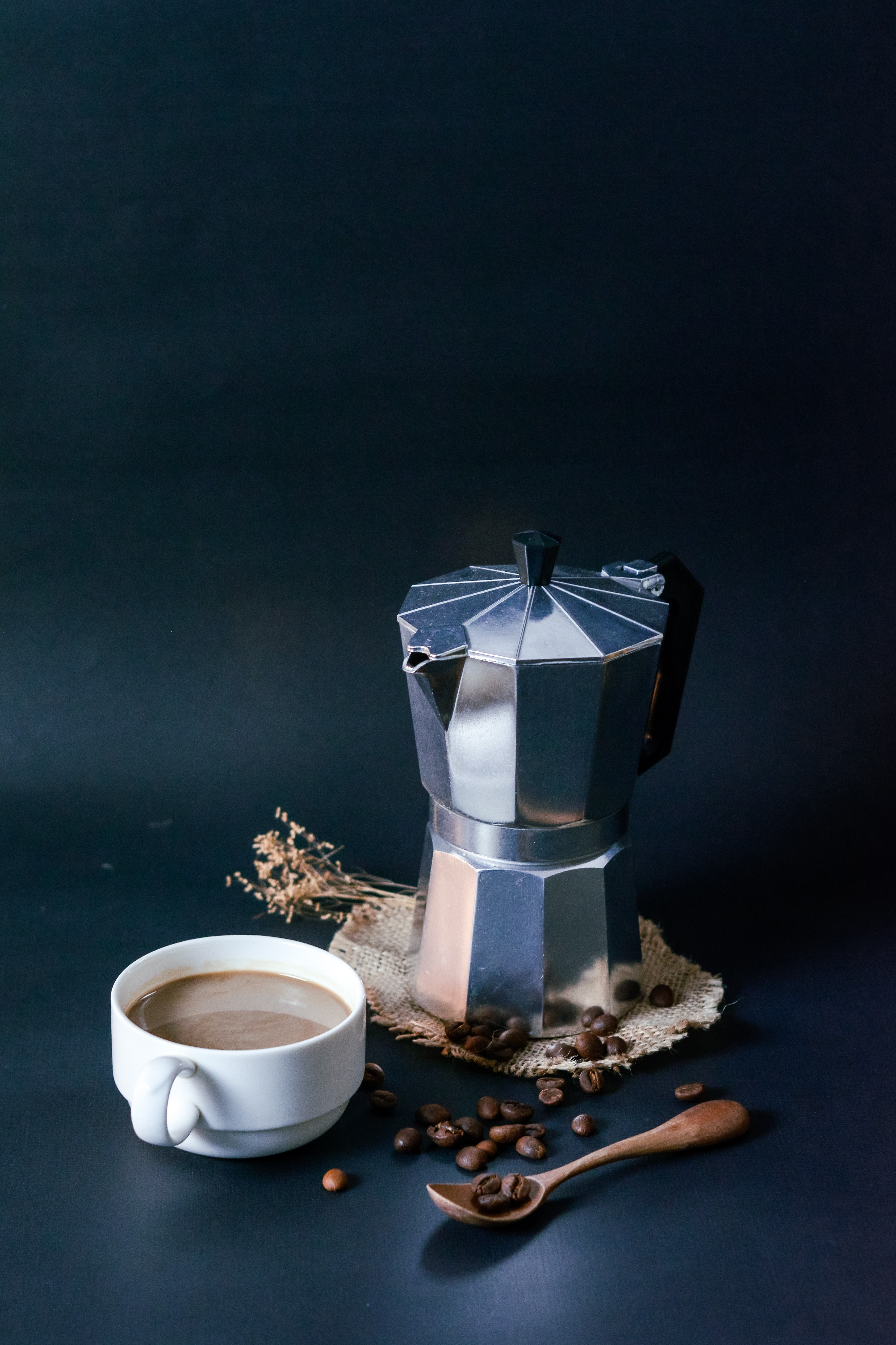 Moka Pot with Coffee and Coffee Bean  