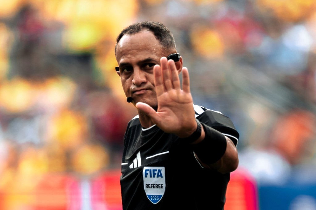 A FIFA referee signals during Brazil vs Norway in the 2026 World Cup Round of 16