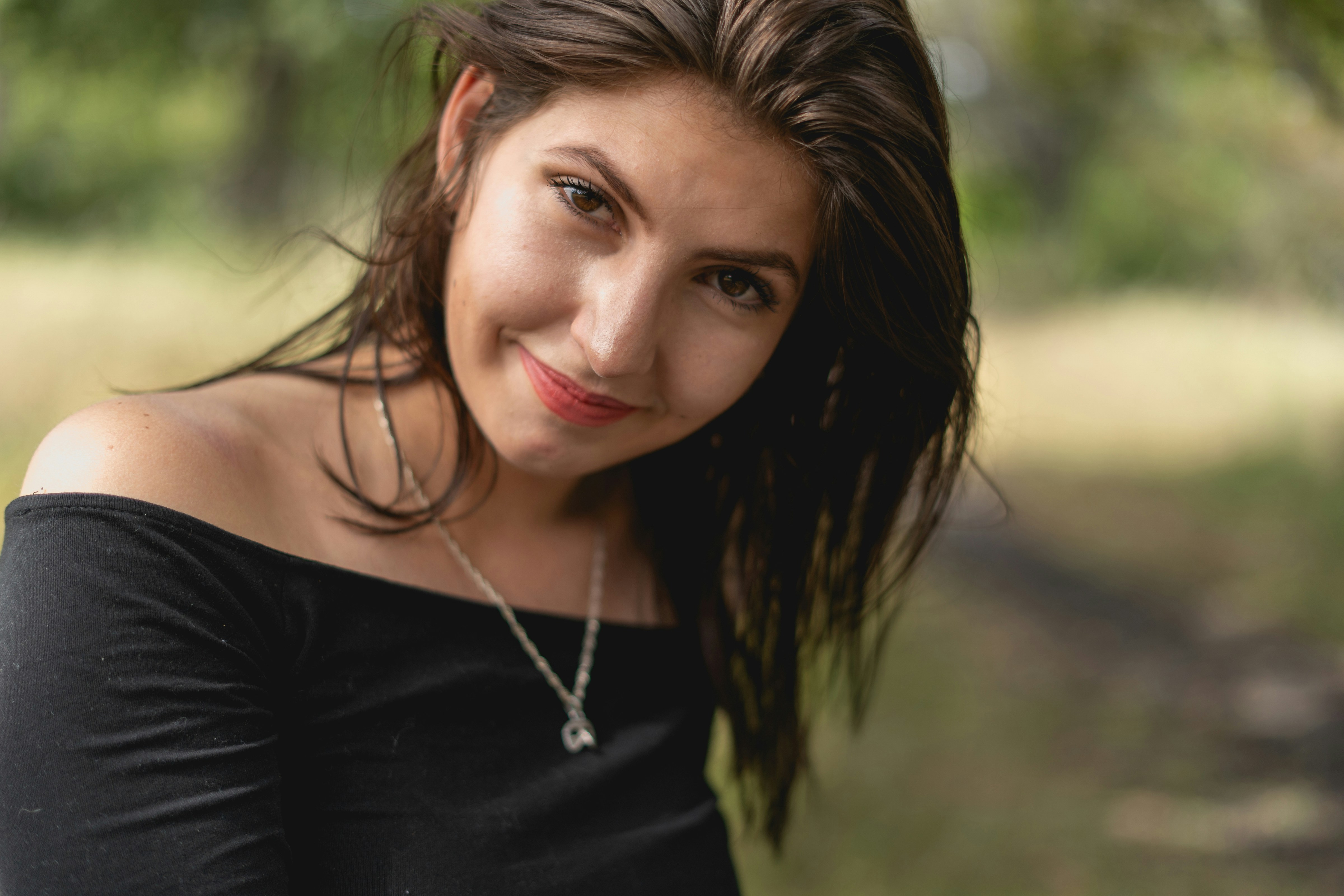 woman smiling back - Neutral Skin Tone Colors To Wear 