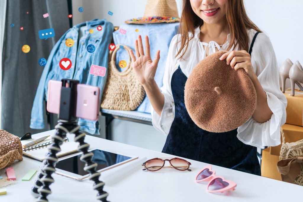 woman filming a tiktok video
