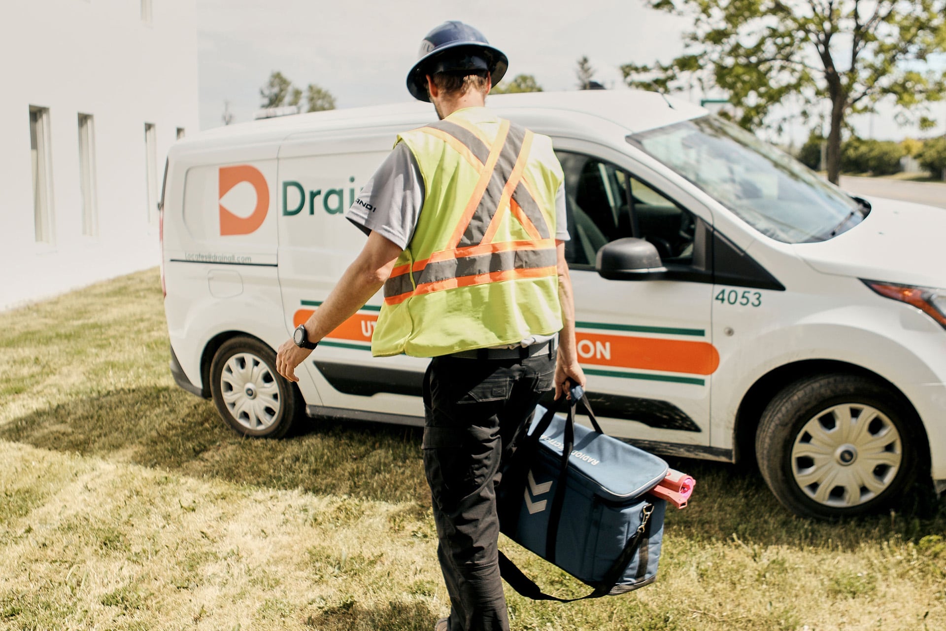 Drain-All logo sign on van.