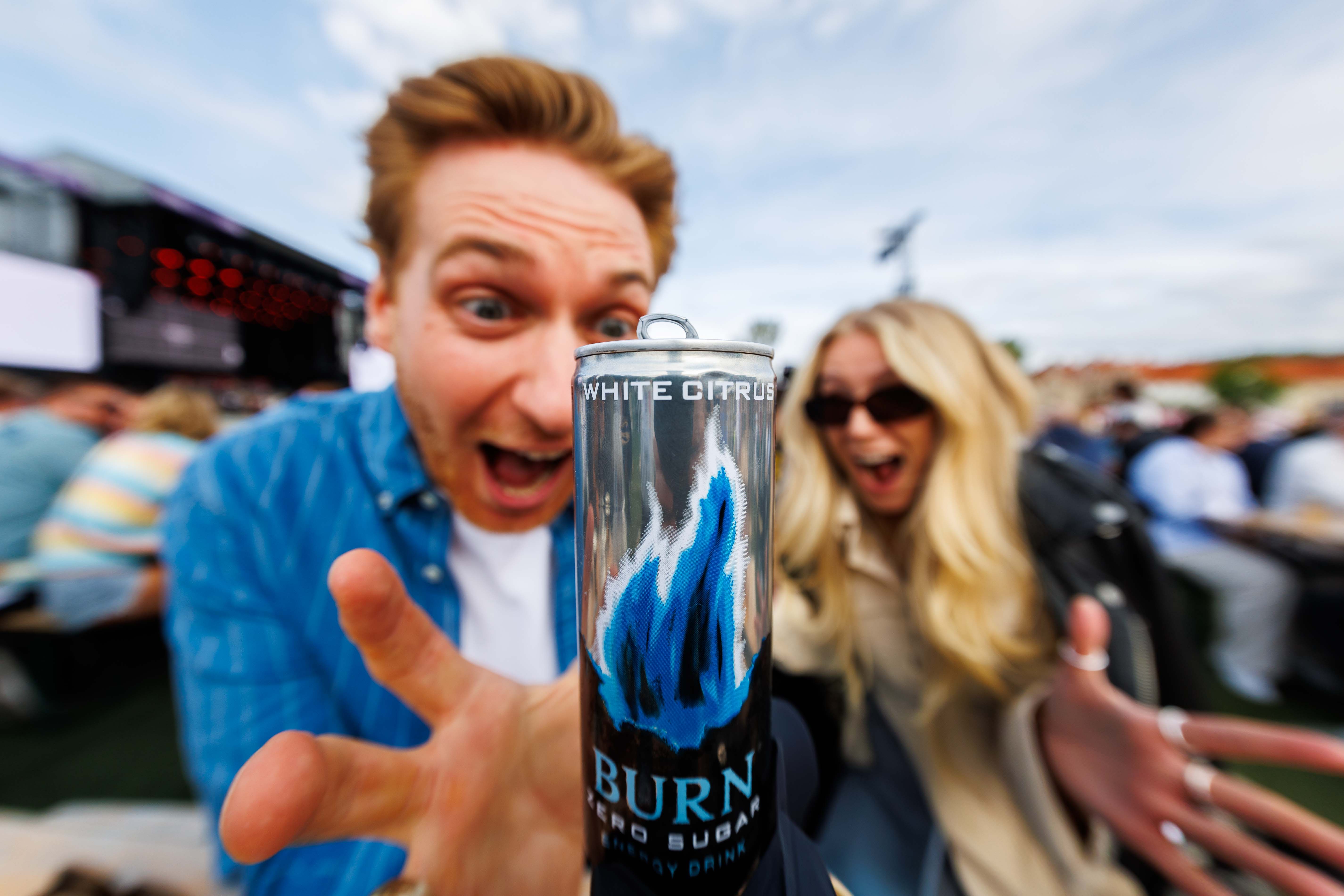 haukeland reaching for a new can of burn energy at neon festival 2025