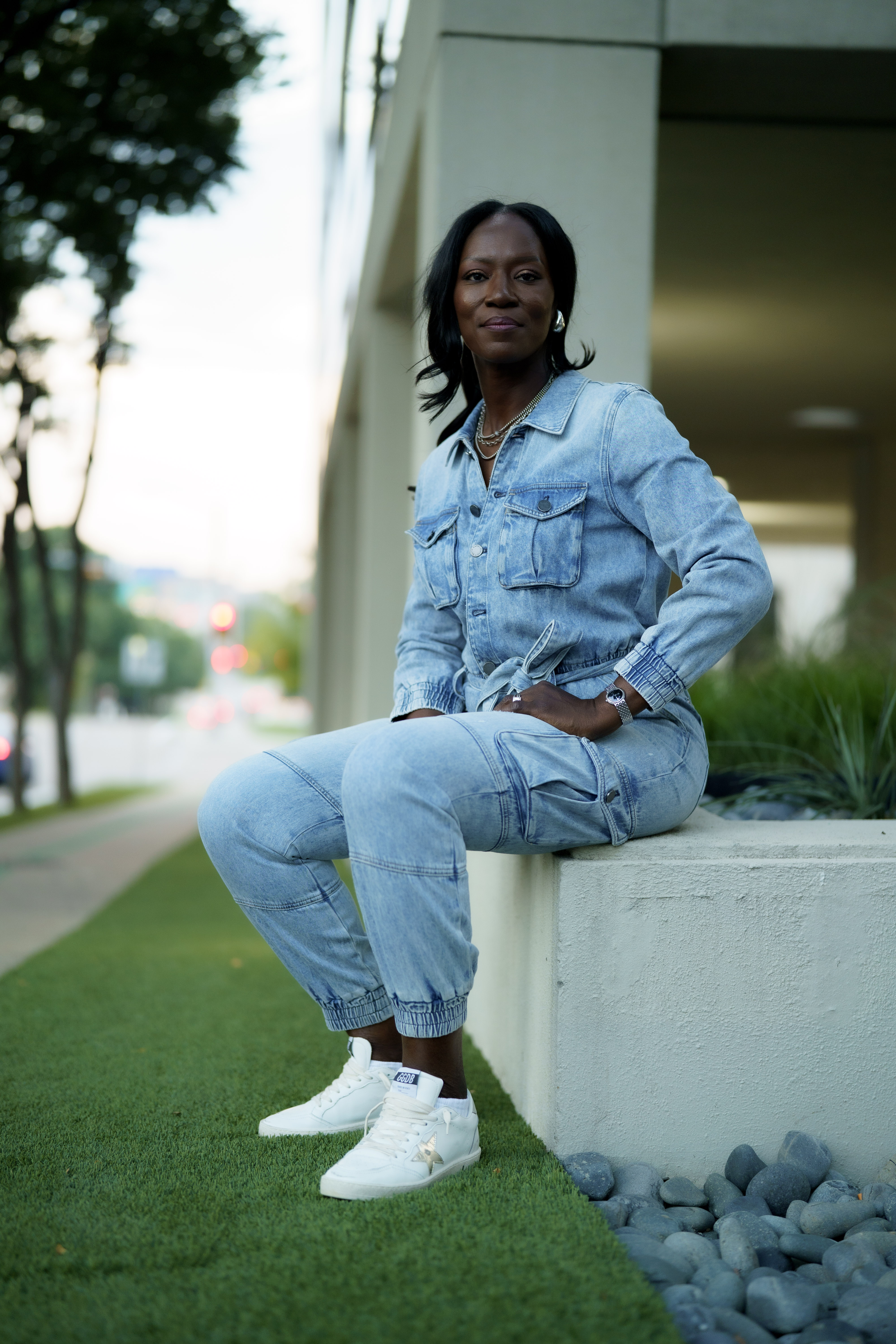 Woman by the sea with waves splashing