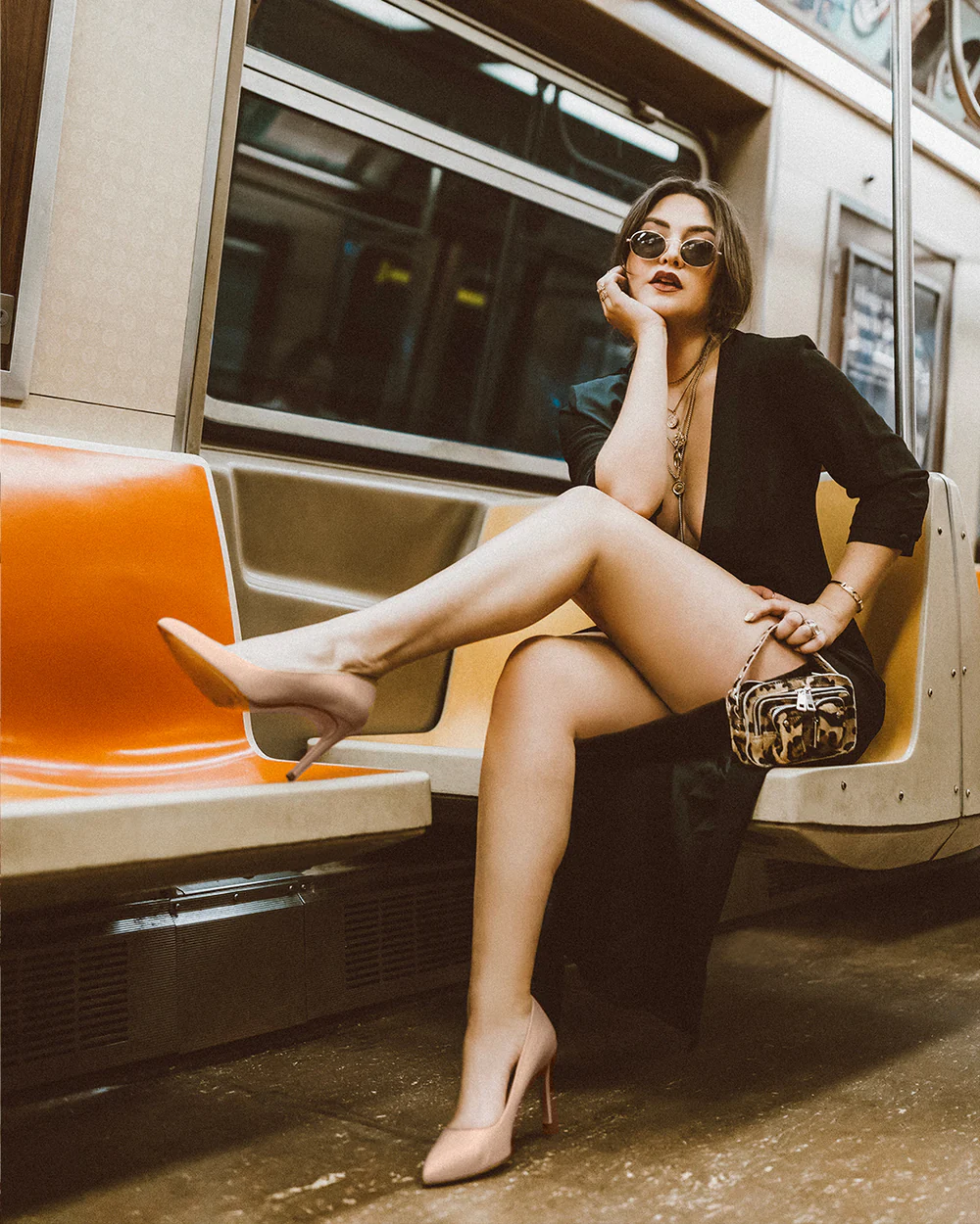 WOMAN ON SUBWAY WITH GREAT SHOES
