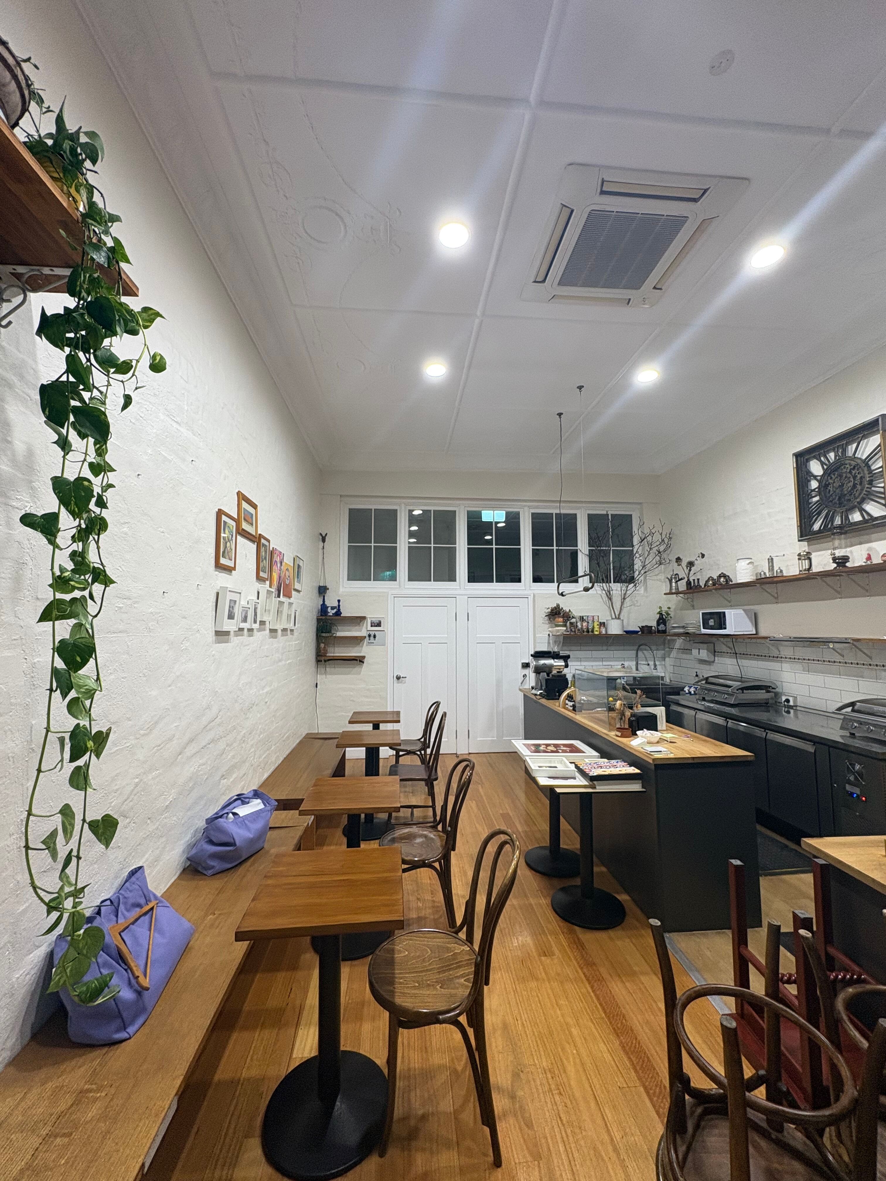 kitchen with two brown wooden chairs