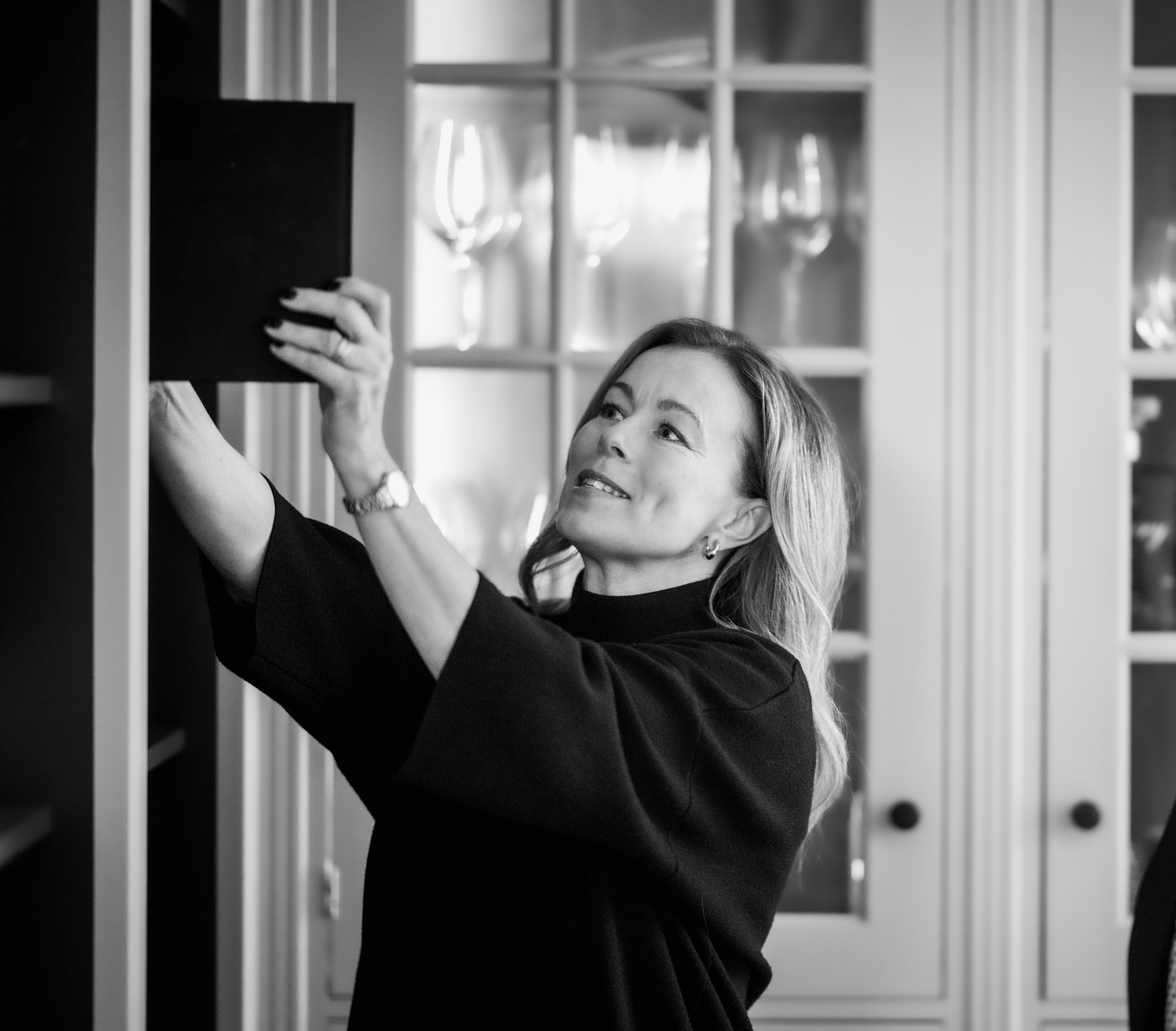 a man in a yellow shirt is on a red track