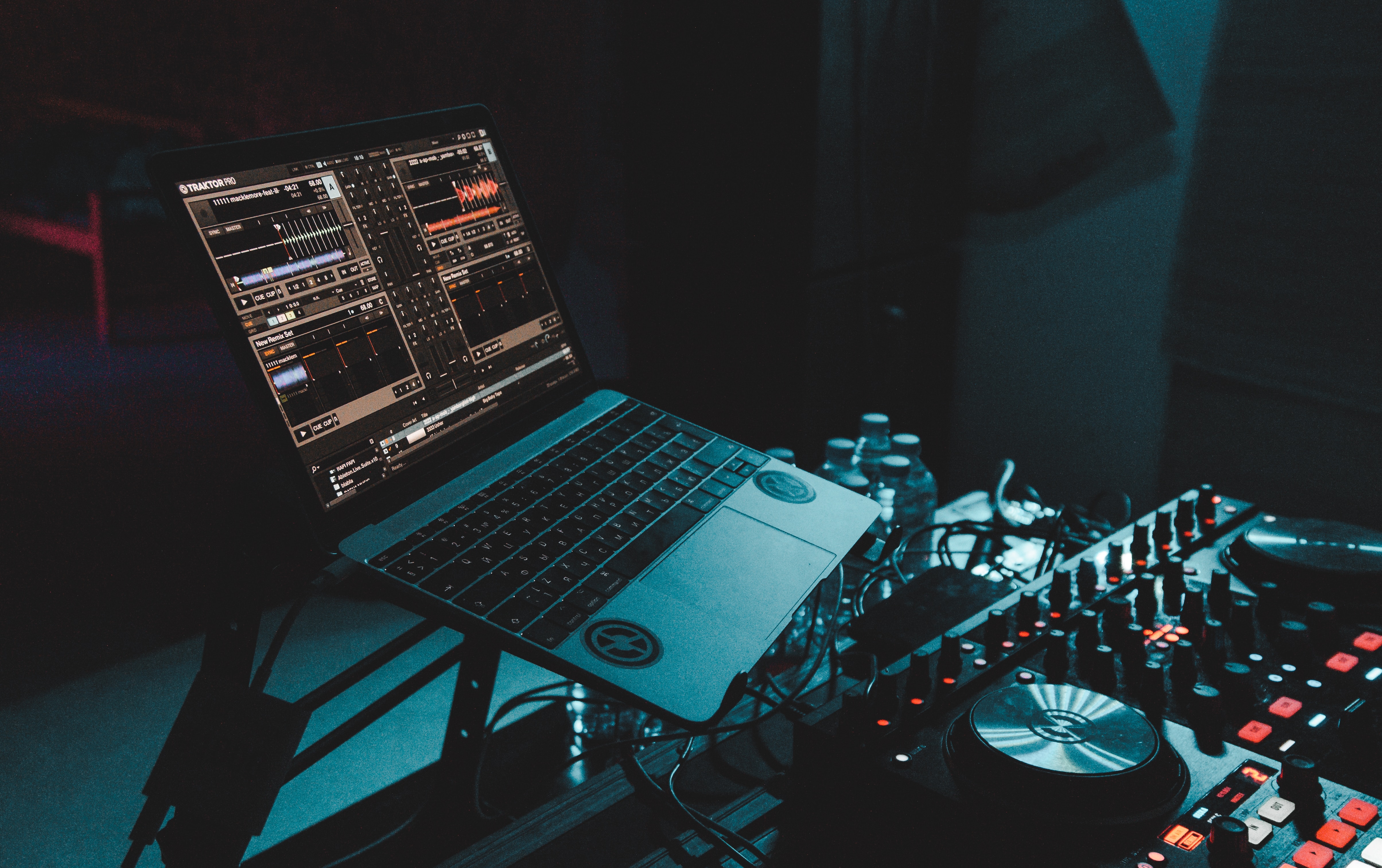 a studio setup with mounted laptop - how to make ai cover songs