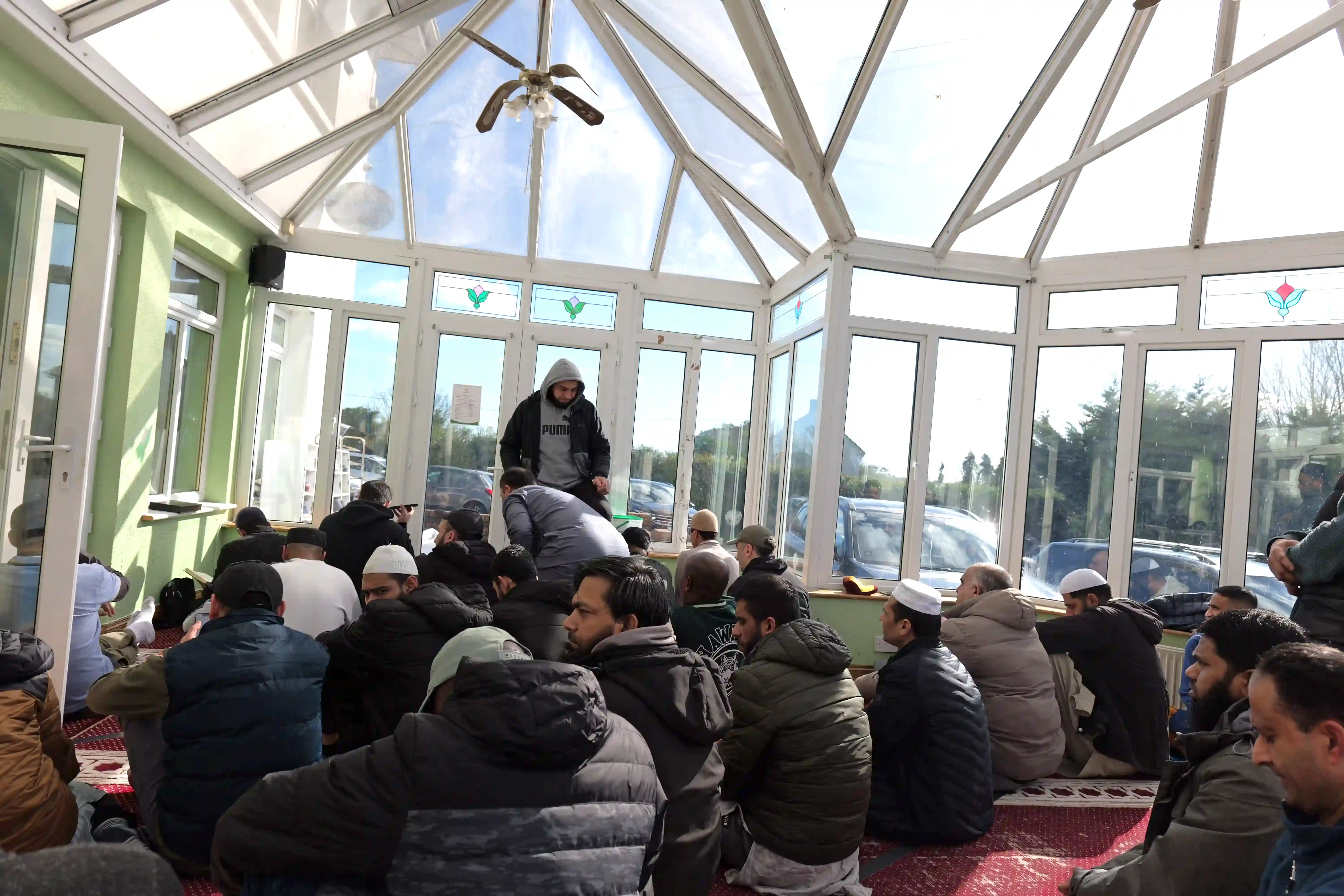 woman in white shirt wearing white helmet