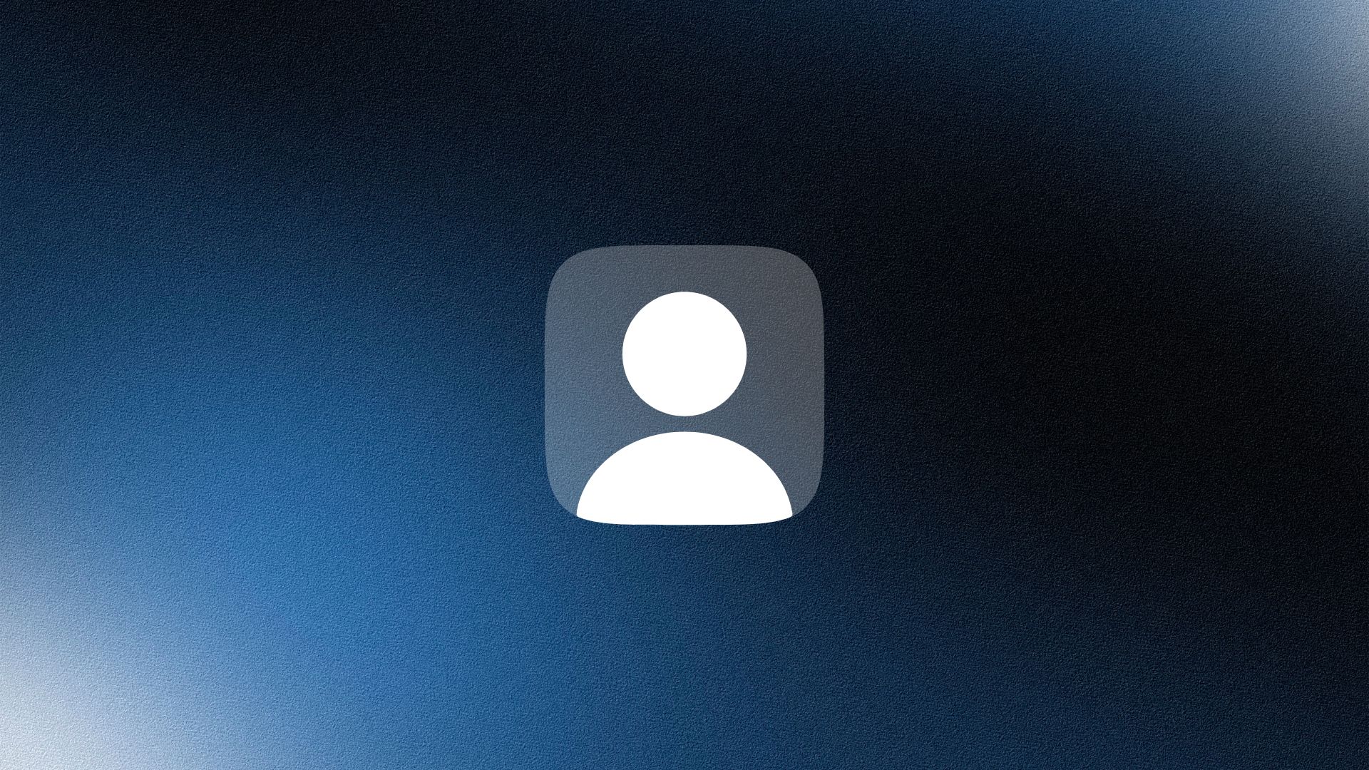 Two professionals standing confidently in front of bookshelves, both with arms crossed, in a softly lit office.