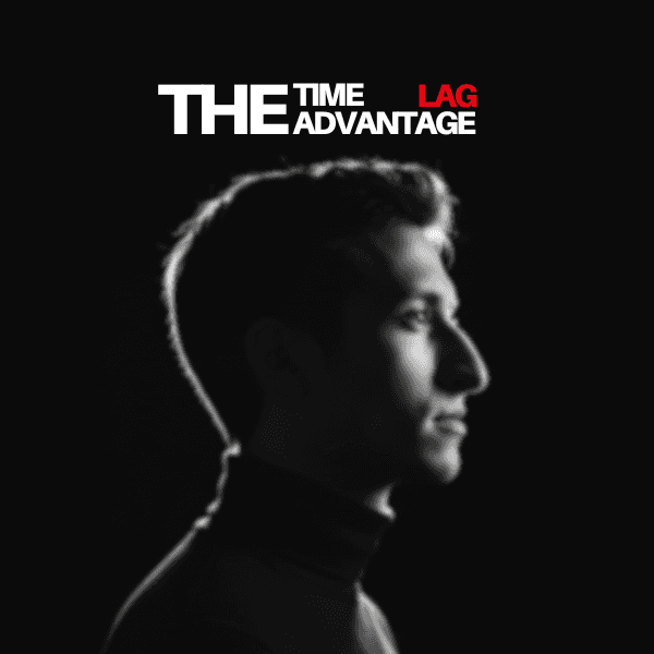 gold and black bottle on white wooden table