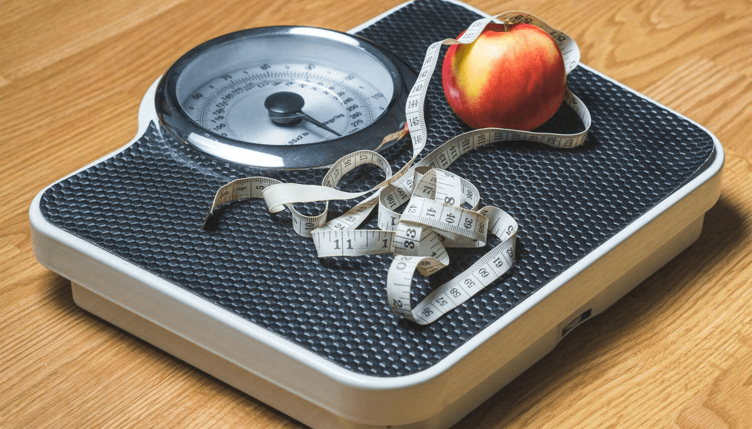 How to Tell If You're Skinny Fat (and what to do if you are) weight scale apple