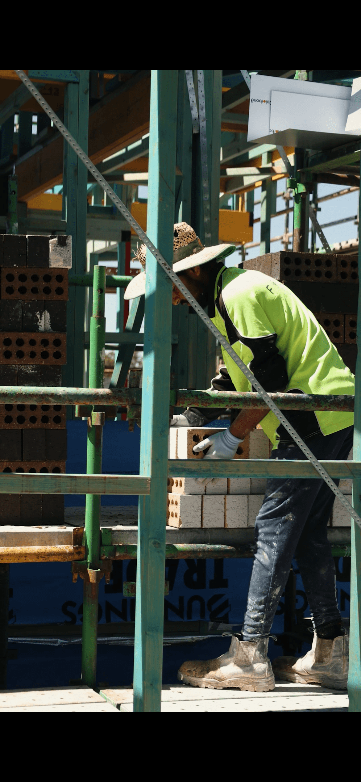 Architectural modern home with sharp lines and car parked outside, Verdant House