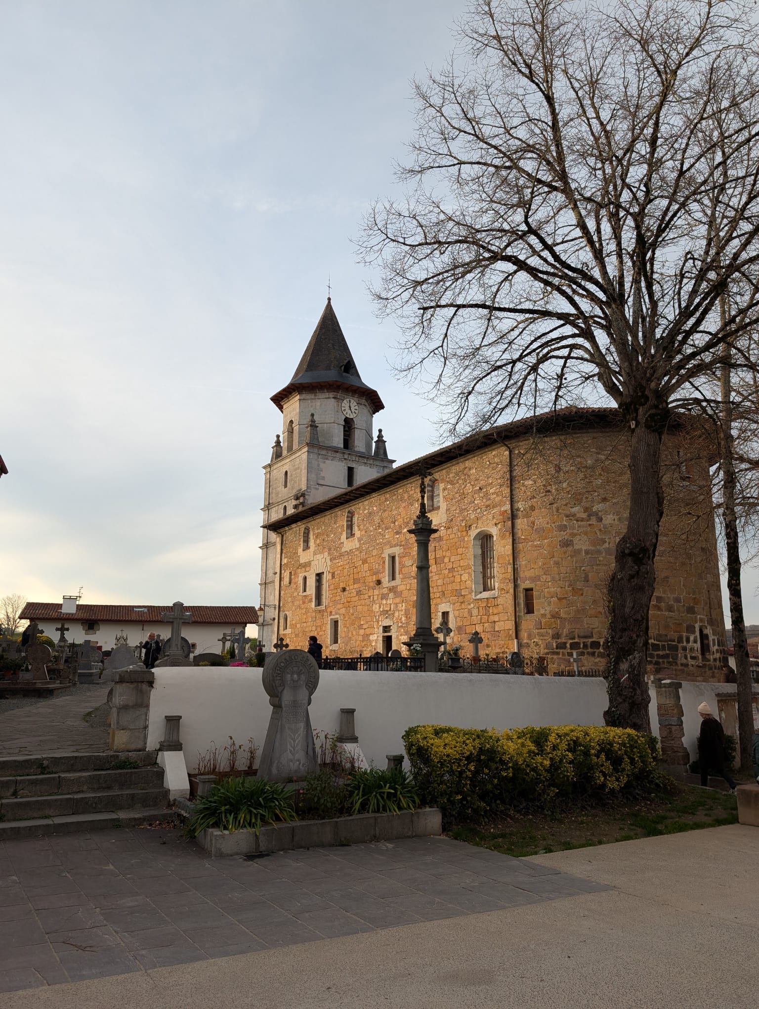 The vintage wooden rack railway of La Rhune climbing the mountain, offering panoramic views of the Pyrenees and the Atlantic coast.