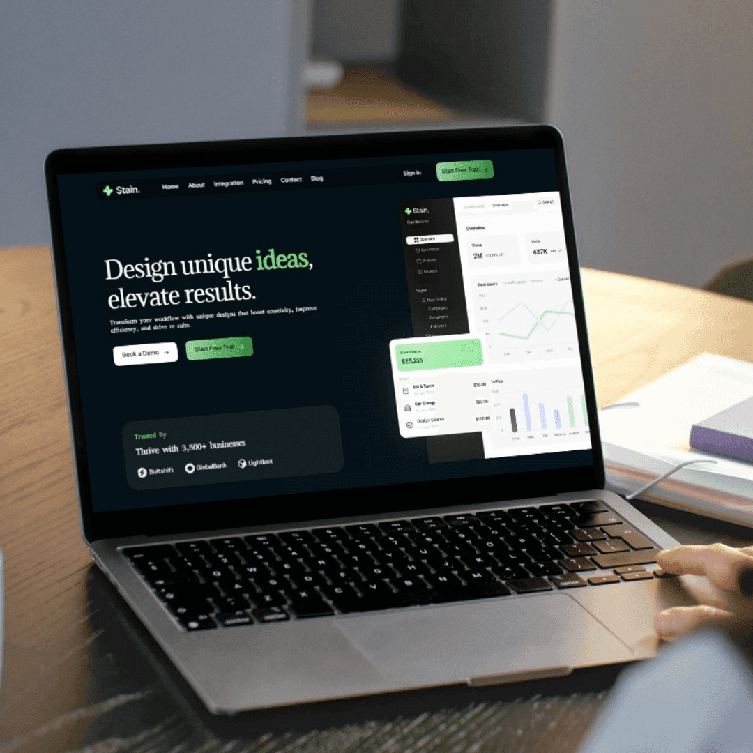 Red trolley car driving down a tree-lined street.