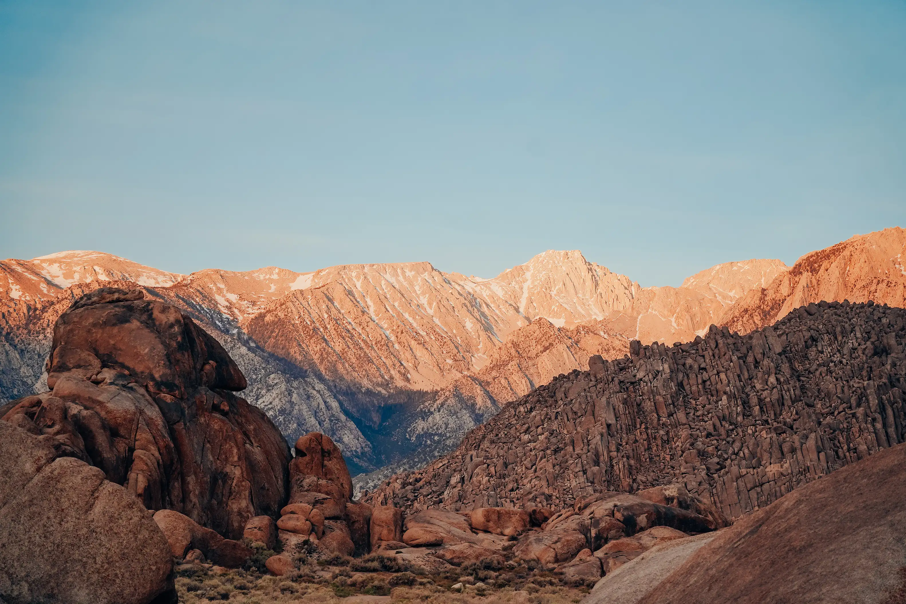 A mountain range at sunset.