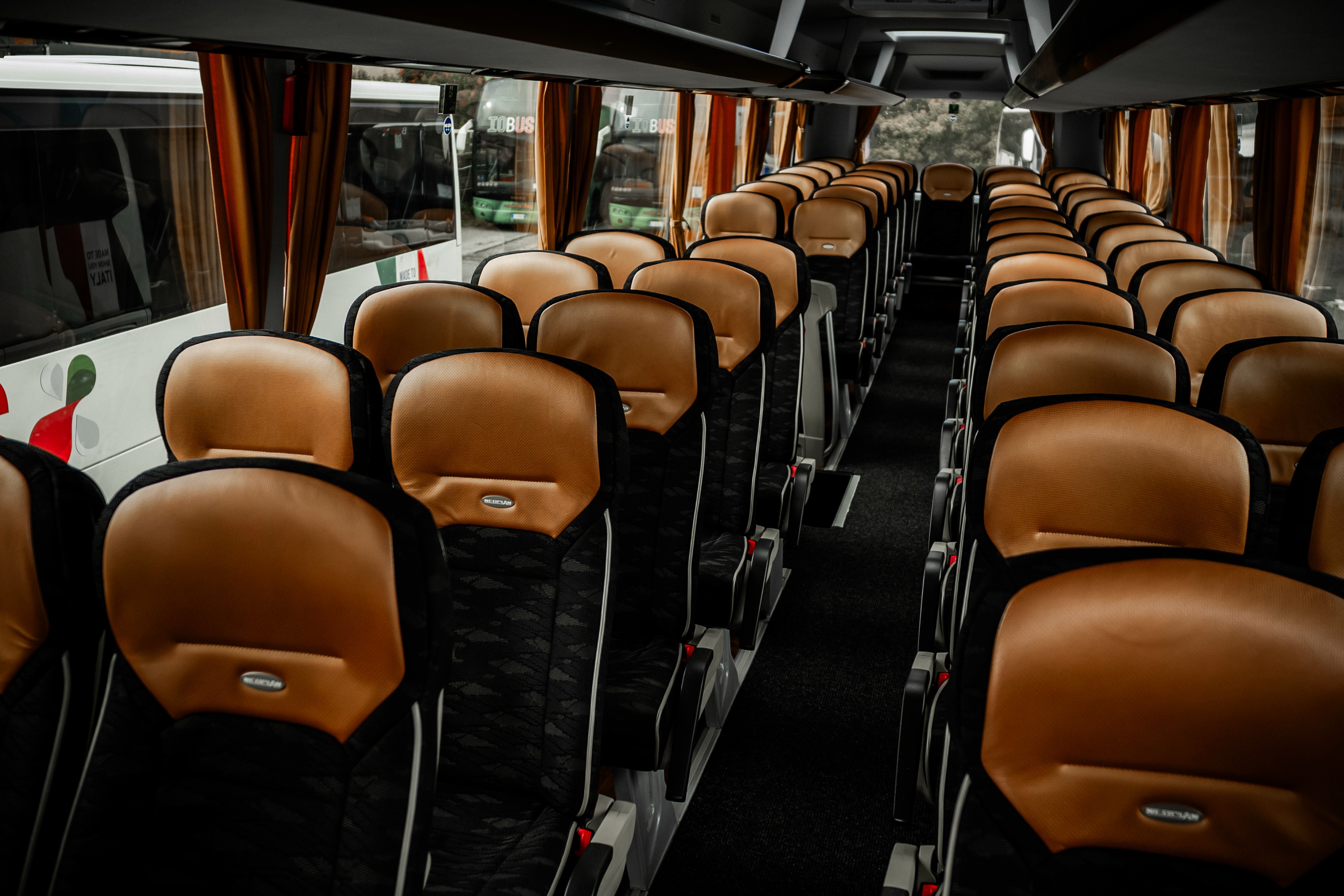 a couple of people standing on top of a mountain