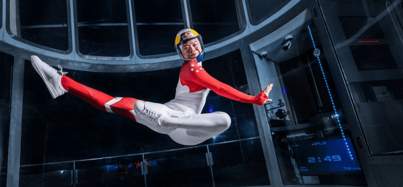 A kid practicing surfing