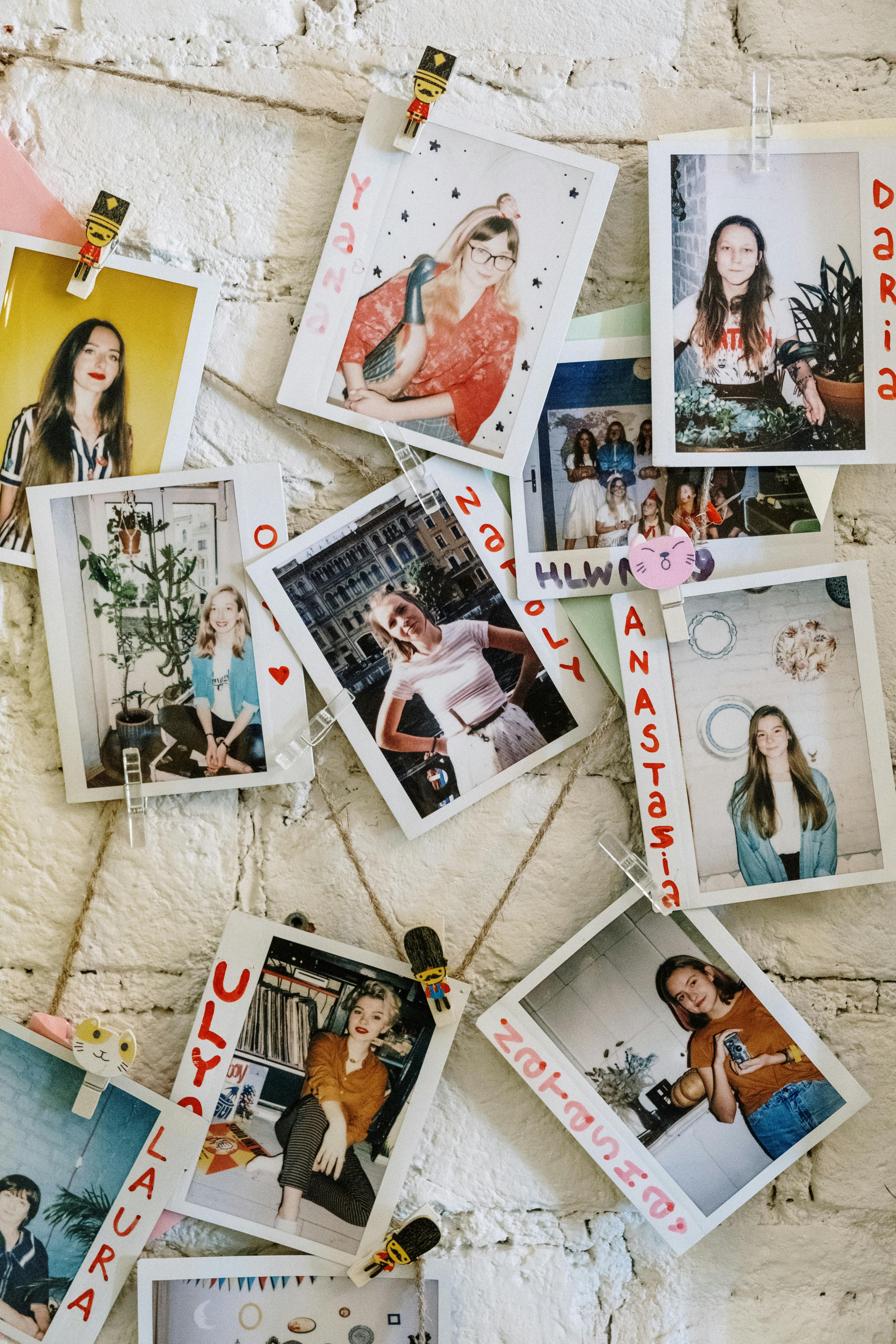 a-vibrant-collection-of-polaroid-photos-creatively-displayed-on-a-textured-brick - cottonbro-studio (pexels)
