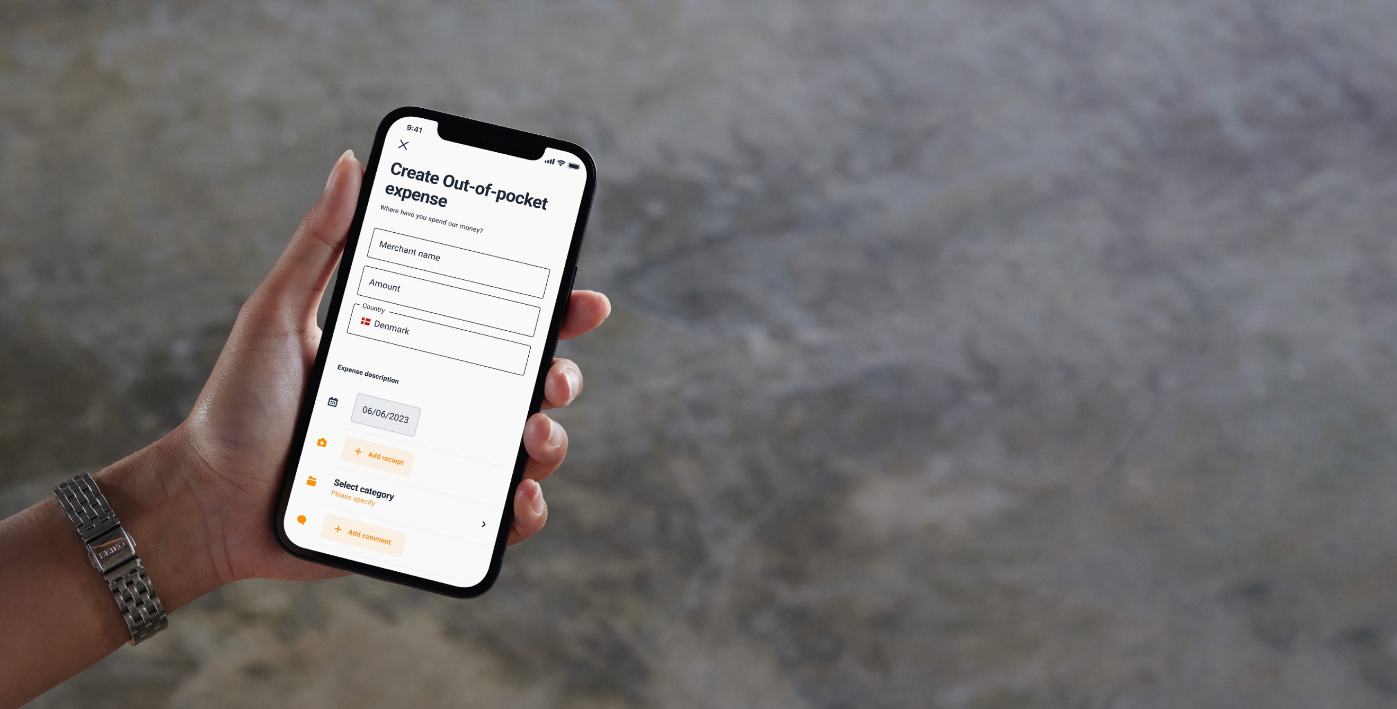 Hand holding an iPhone displaying the Cardlay Expense app with the ‘Out-of-Pocket Expenses’ section visible.