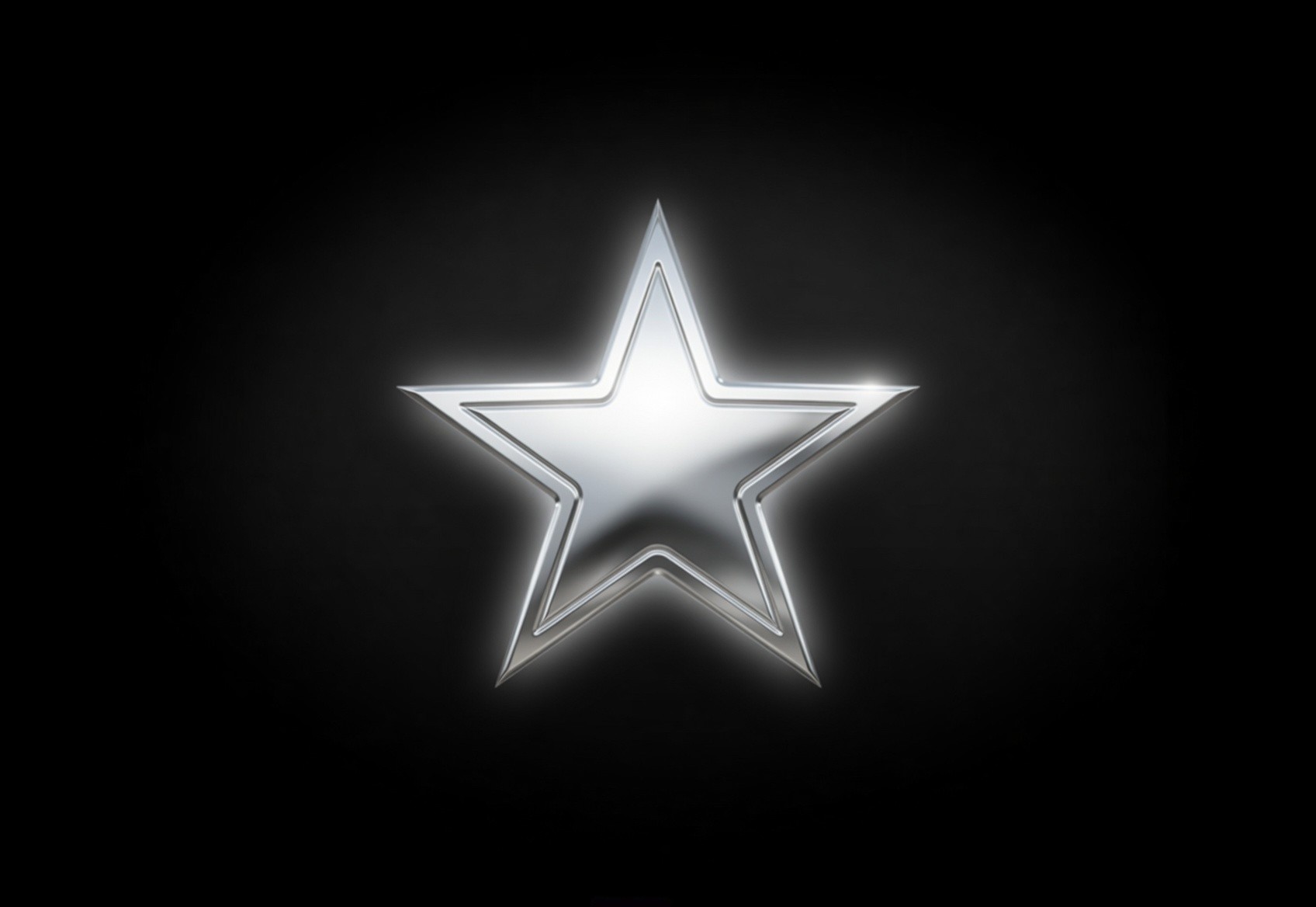 A black watch with a glowing face displayed against a solid black background, emphasizing its sleek design.