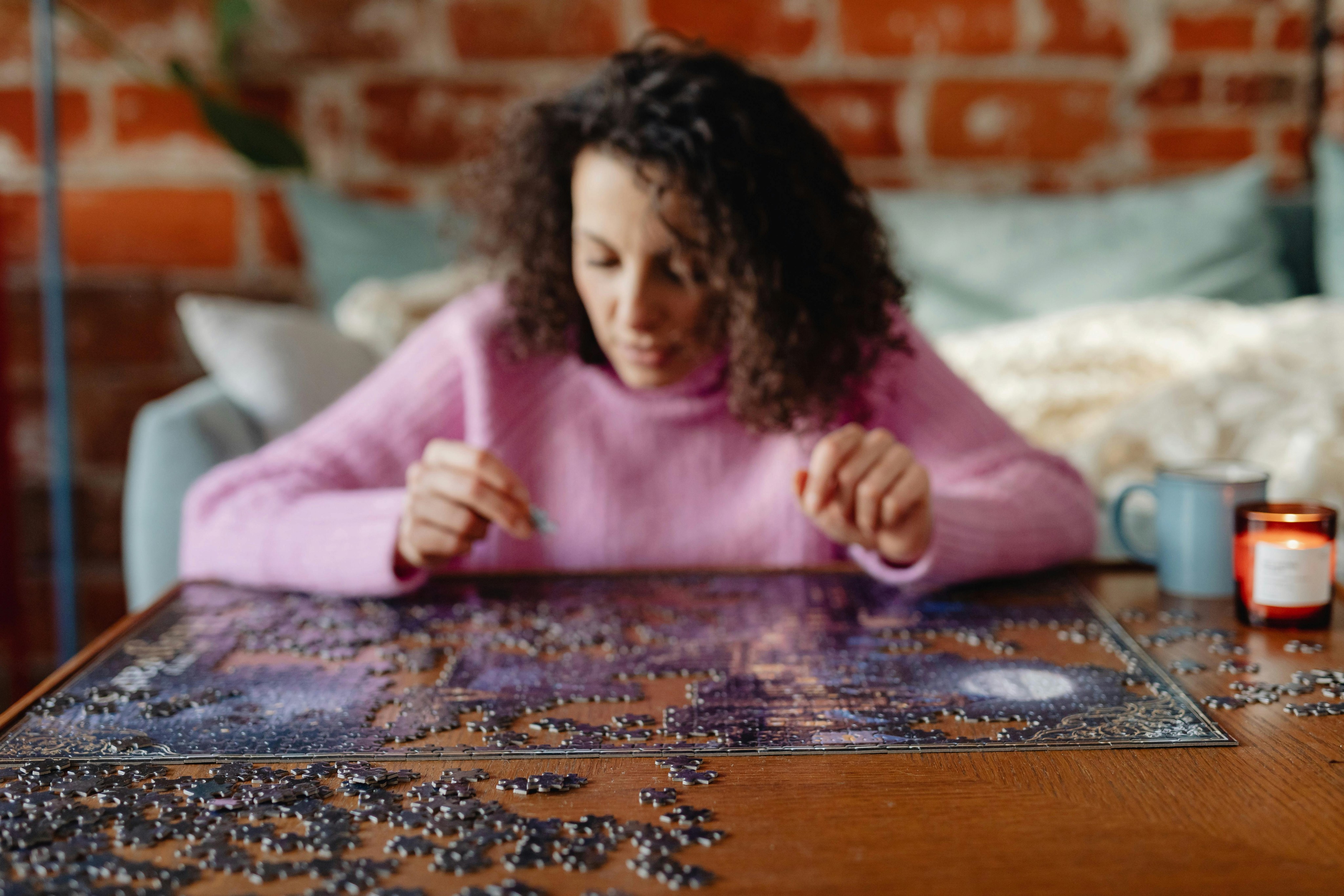 Woman building a puzzle