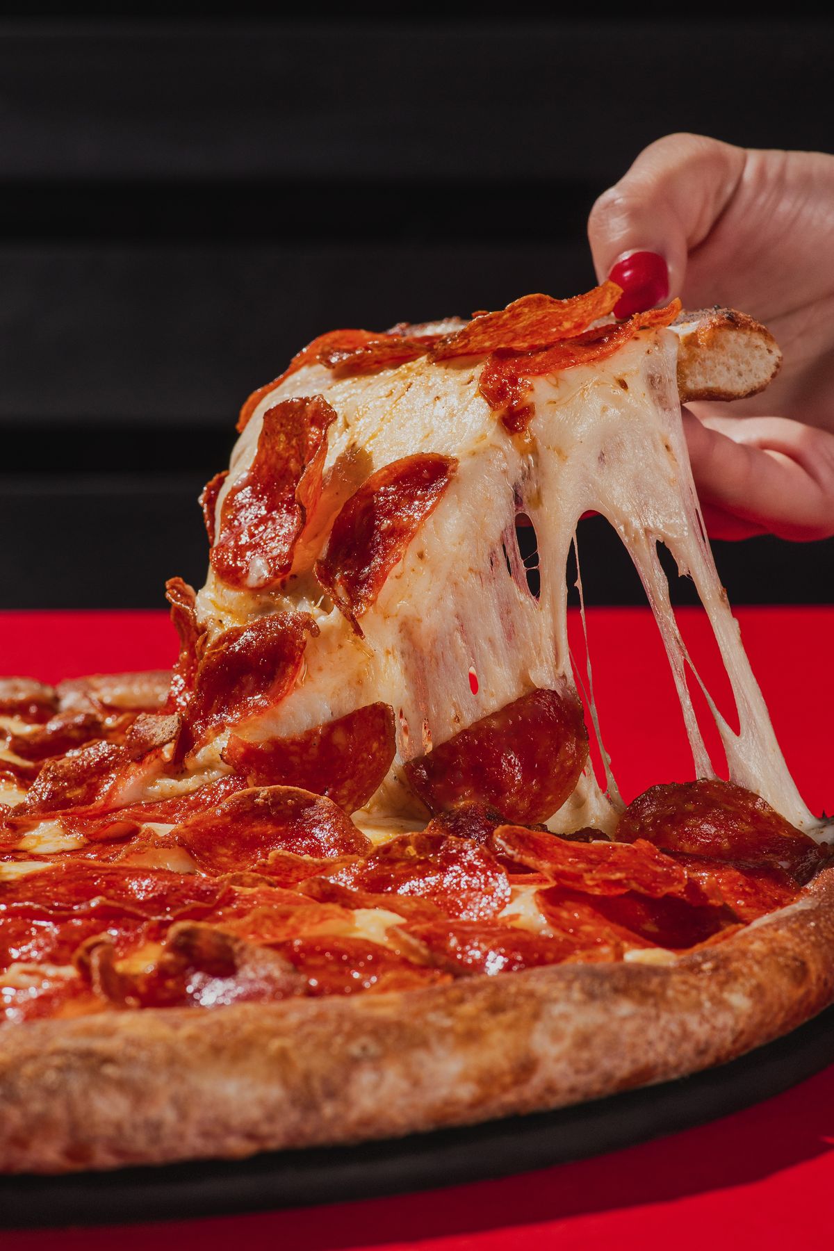 NY Pepperoni Pizza from Pasta 9 Toronto topped with double mozzarella and classic pepperoni slices for bold flavor.