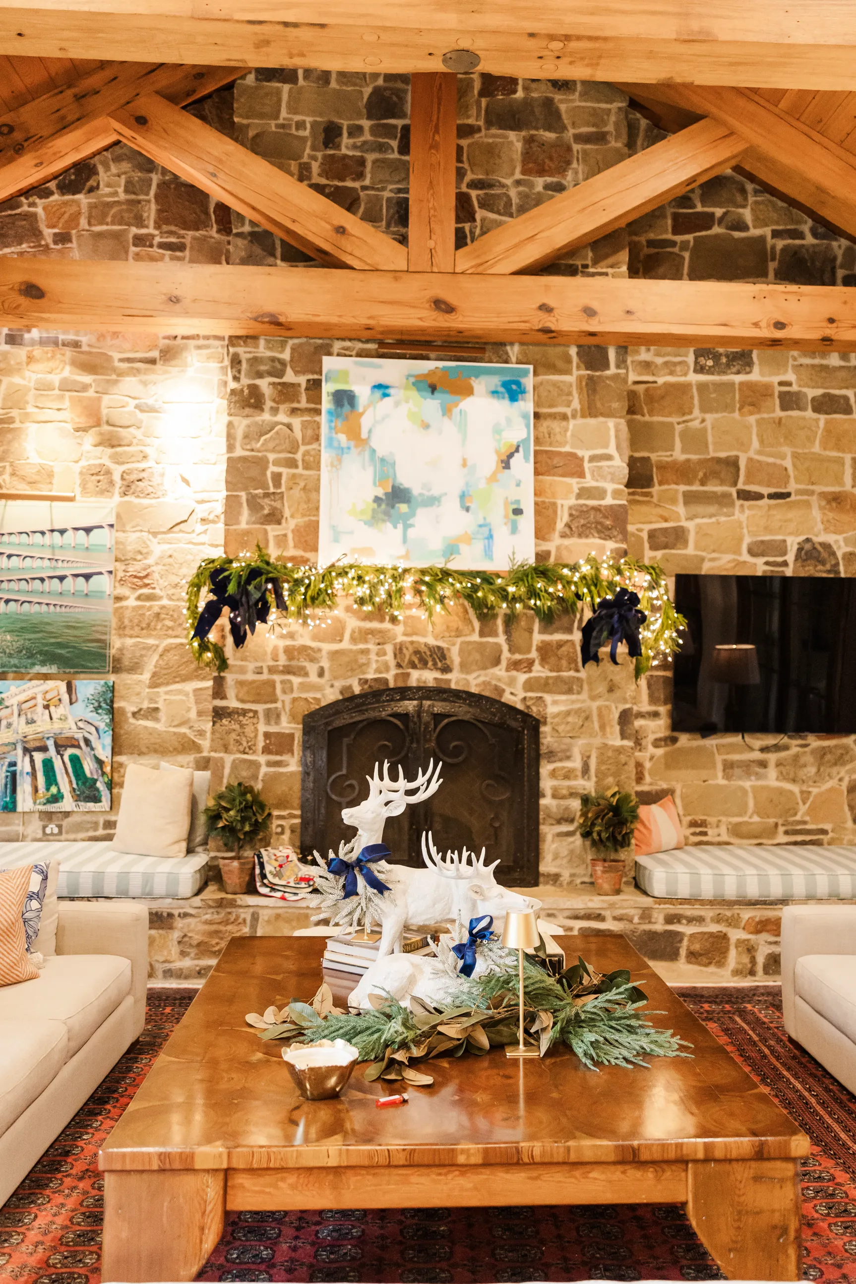 Luxury table setting by Sarah Overall Events with pink embroidered napkins, gold-rimmed plates, floral arrangements, and personalized menus in Shreveport.