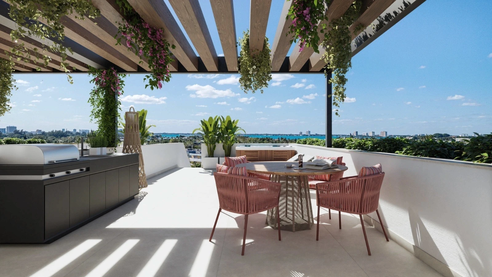 Rooftop outdoor kitchen and dining area at Byron Avenue Residence in North Beach, Miami Beach, with wood pergola, spa and bay views